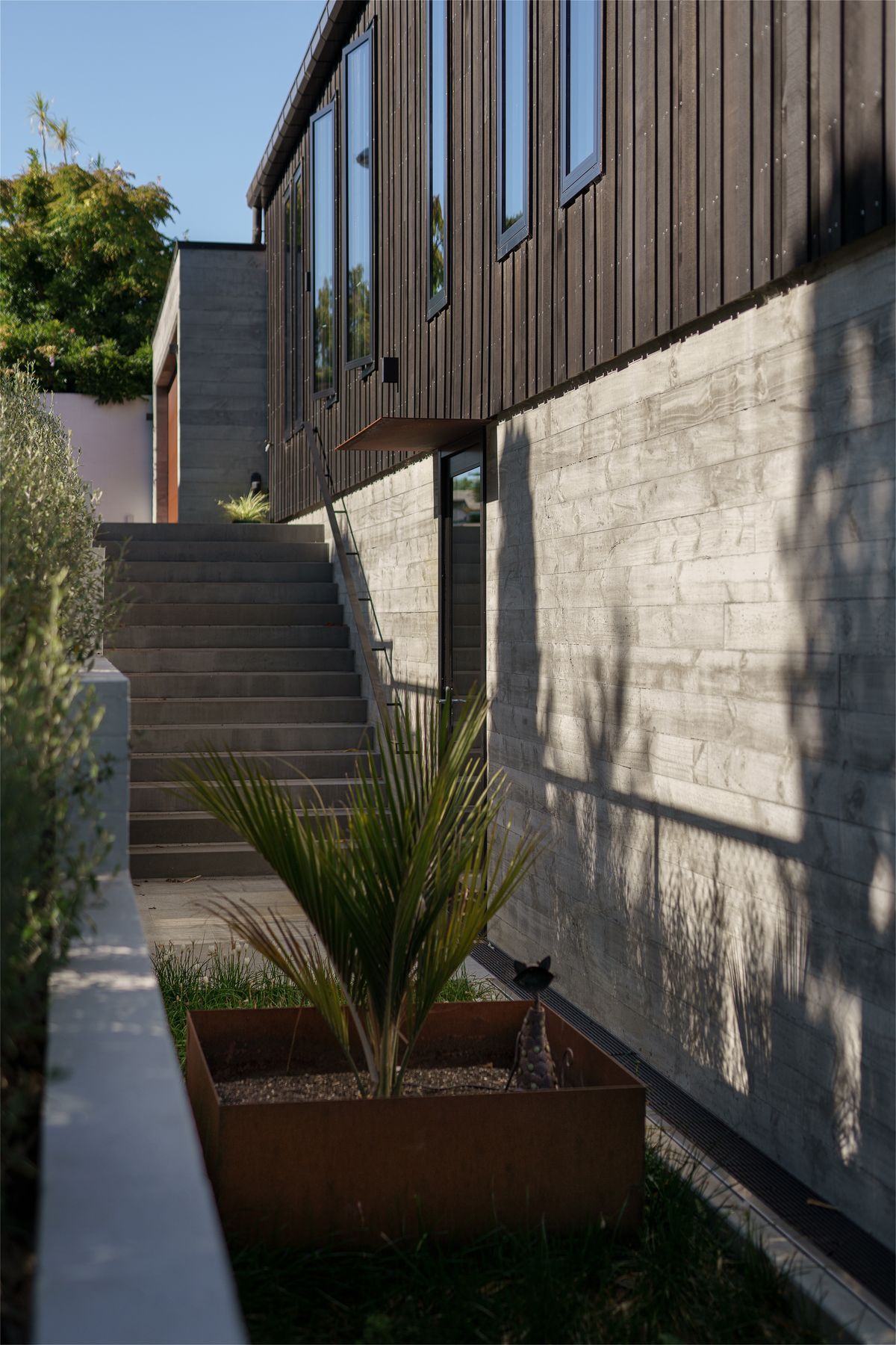 The house was positioned so a driveway could fit down the side, in case of future development of the large site.