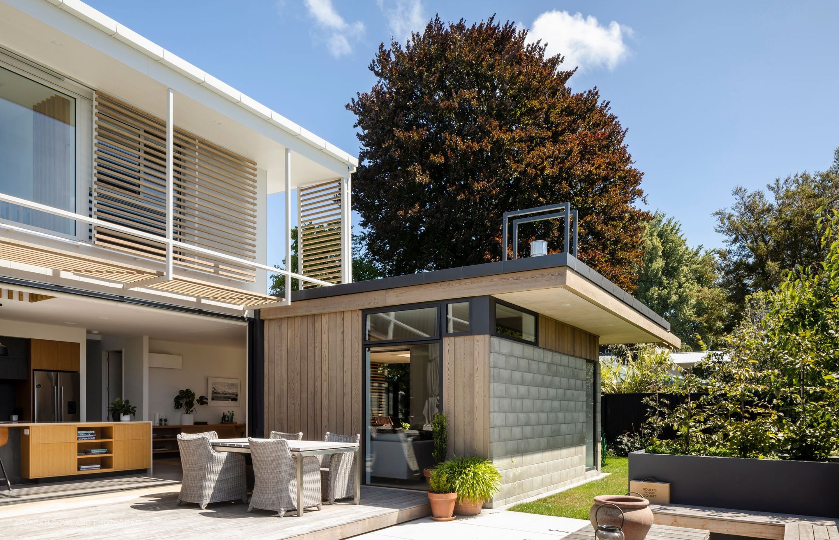 Coming from a large, rural property, the clients wanted a home that would capture the sun and maintain a strong connection to the outdoor spaces and greenery.