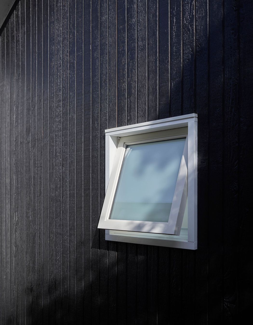 Shou Sugi Ban cladding, frosted window