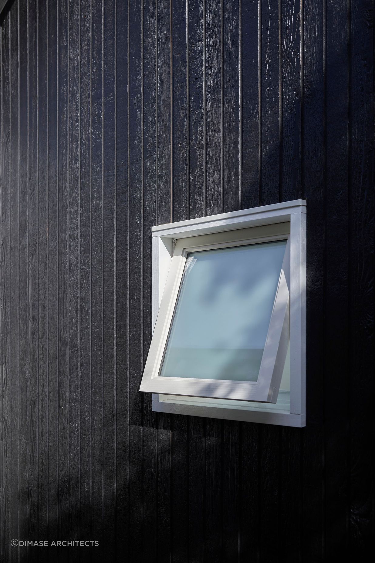 Shou Sugi Ban cladding, frosted window