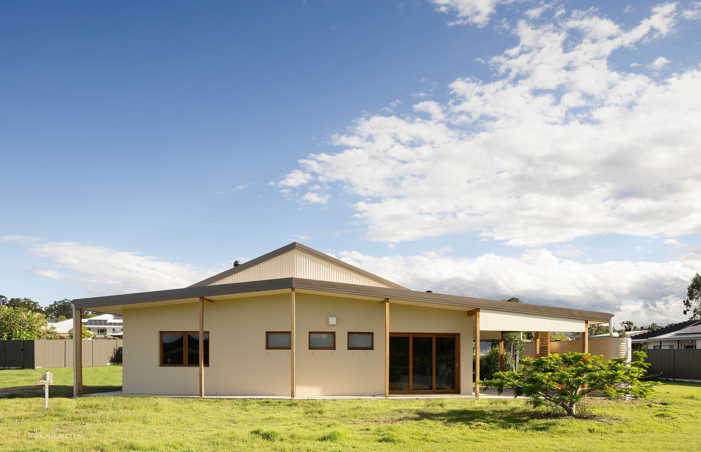 The lines of this dwelling are unique, intentionally invoking a sense of 'village hut' from a distance, to emphasise the communal intent of the dwelling. Photo:®Angus Martin