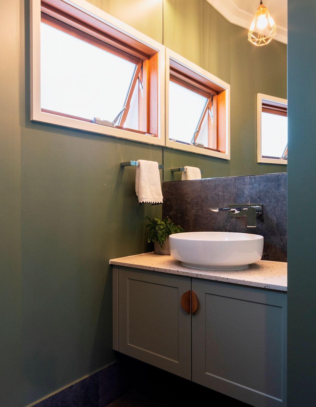 A combination of traditional QLDer breezeways and Fanco's Habitat Expert decentralised HRV units paired are used to automate the provision of fresh air to the home. Photo:®Angus Martin