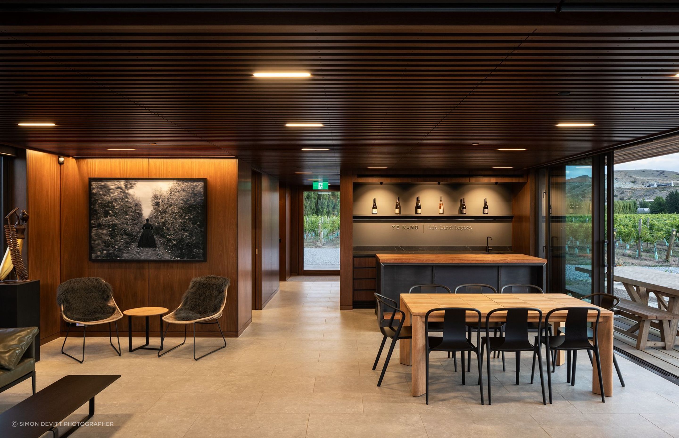 “The building scale is particularly interesting,” says Hamish. “It needed to work with just a handful of people, as well as for large groups and events.” A second container hidden under the structure serves as a wine storage facility.