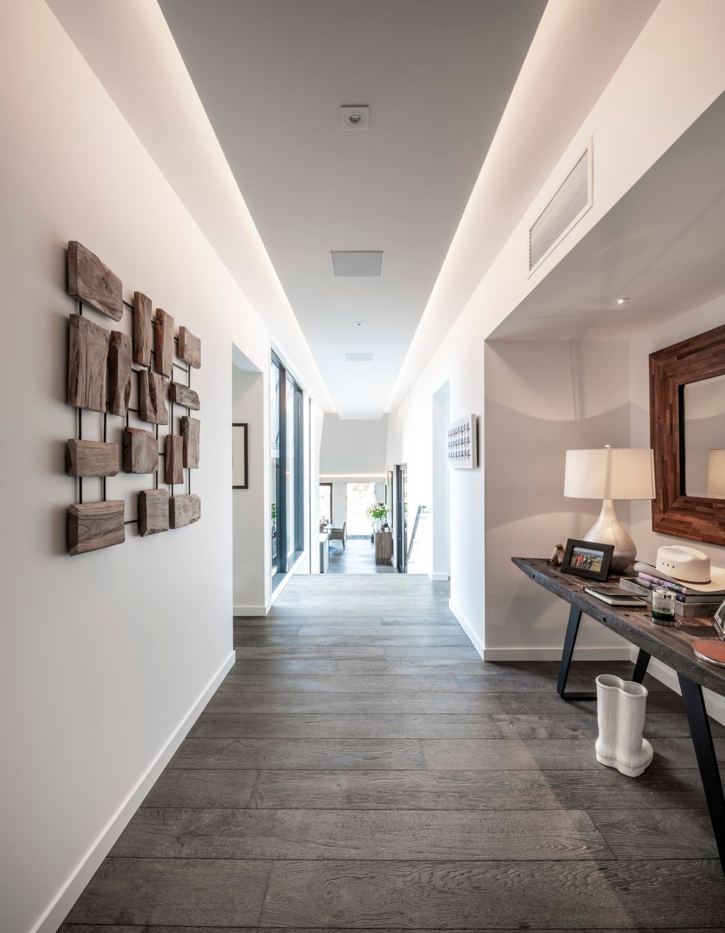 The five gable forms each interconnect with this split level central hallway.