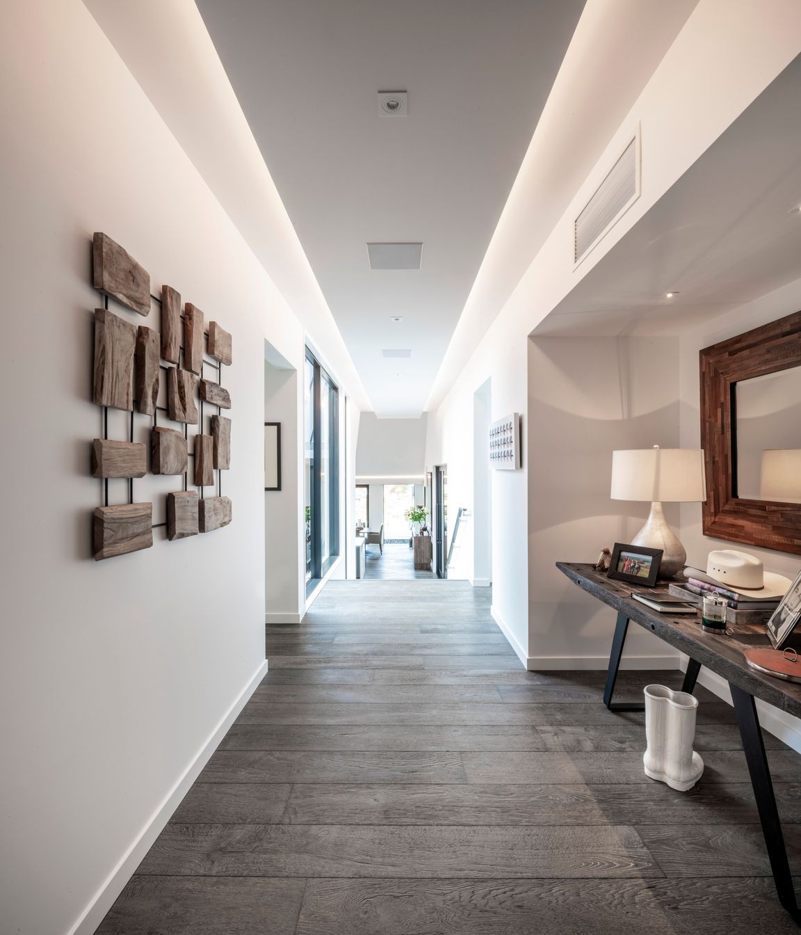 The five gable forms each interconnect with this split level central hallway.