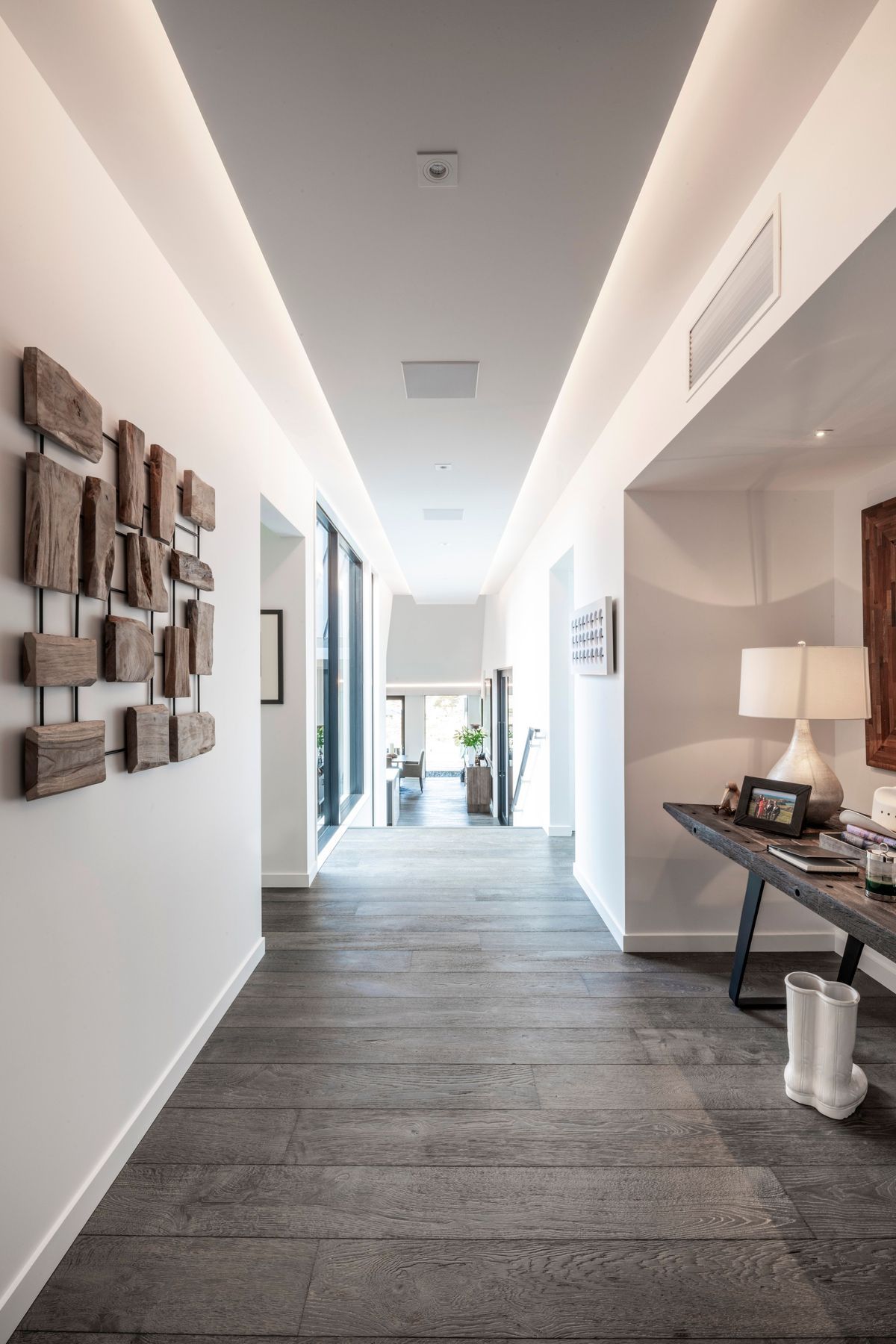 The five gable forms each interconnect with this split level central hallway.