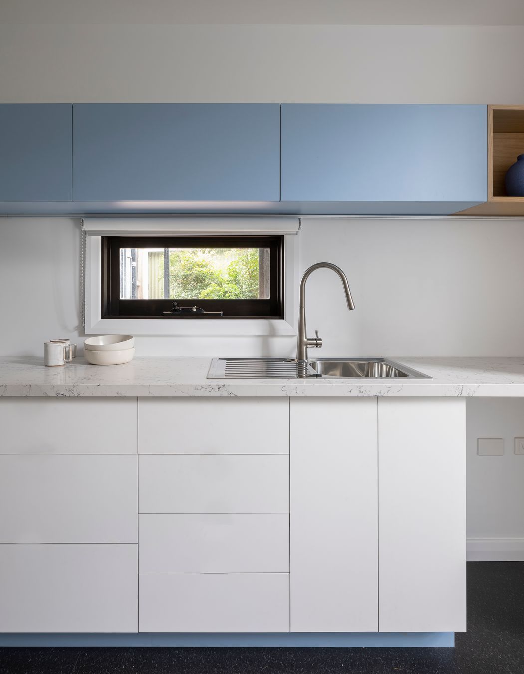 Cool blue, clean kitchenette