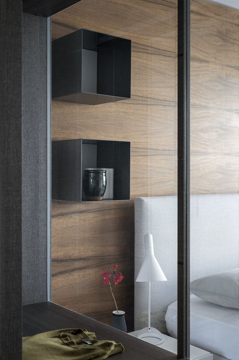 Left: Poliform Ego walk in robe and right the Arca bed and Dream side table also by Poliform.