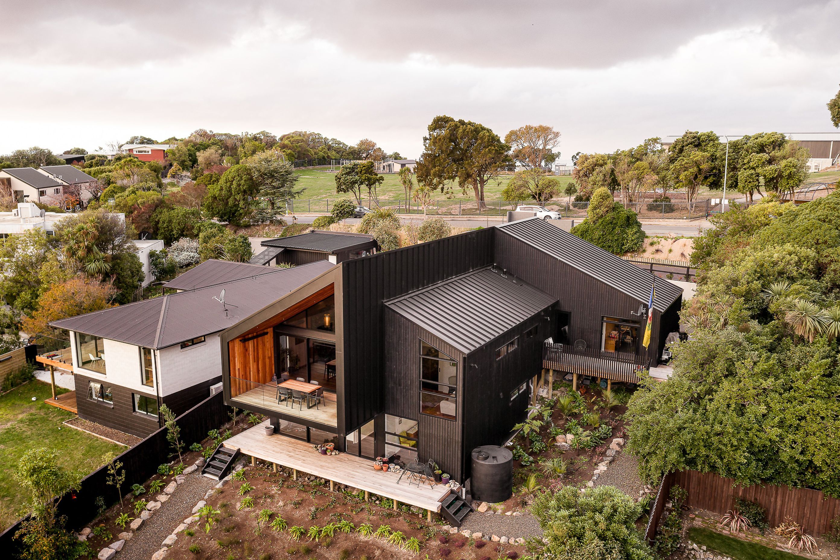 A series of gradated forms was created to break up the overall mass of the house and to accentuate the ridge line of the roof.