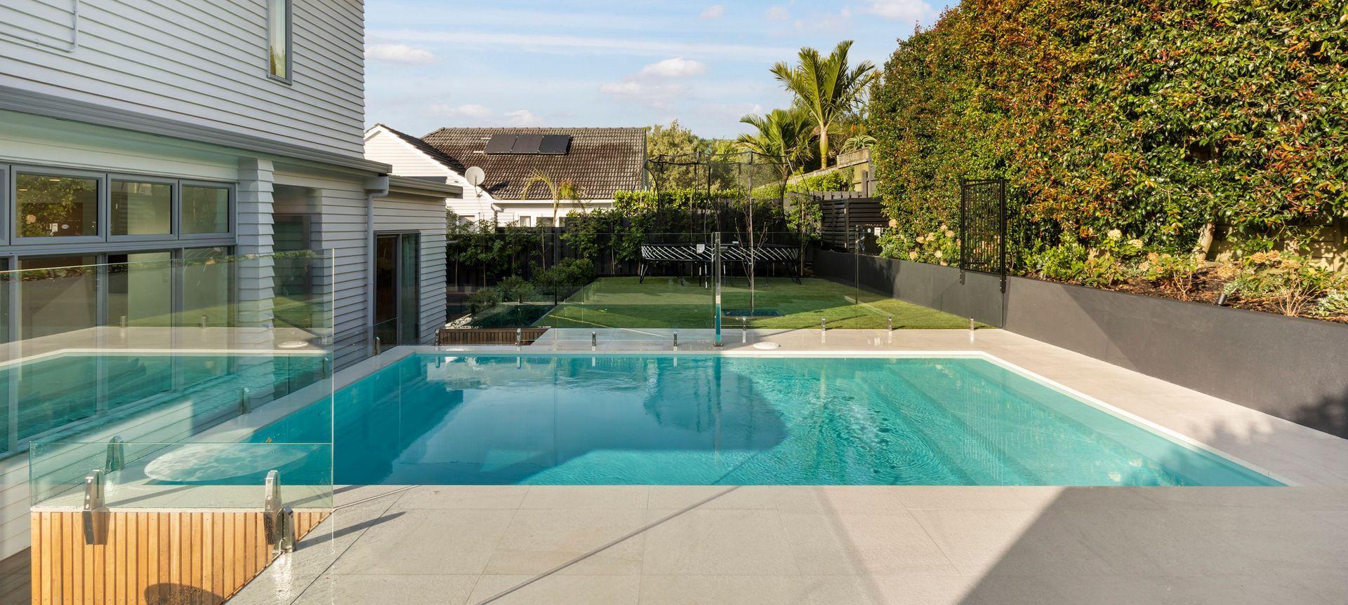 An intensive interior renovation and pool addition banner