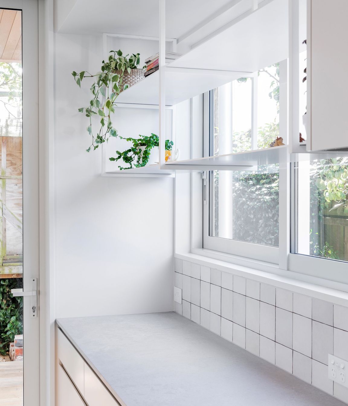 The neutral materiality of the interior will allow it to grow adapt with the homeowners.