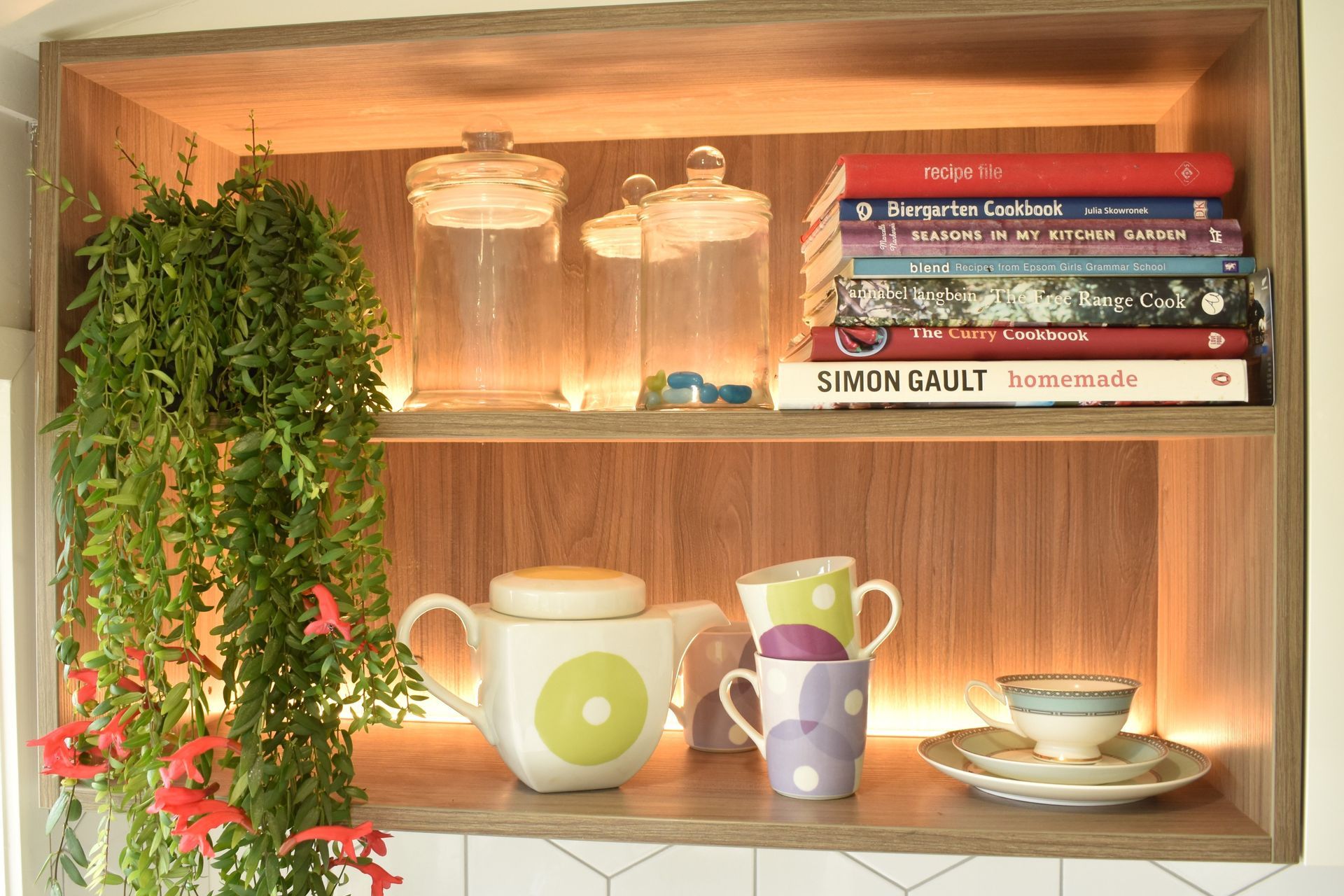 LED lighting in behind the woodgrain open shelving bought the unit to life