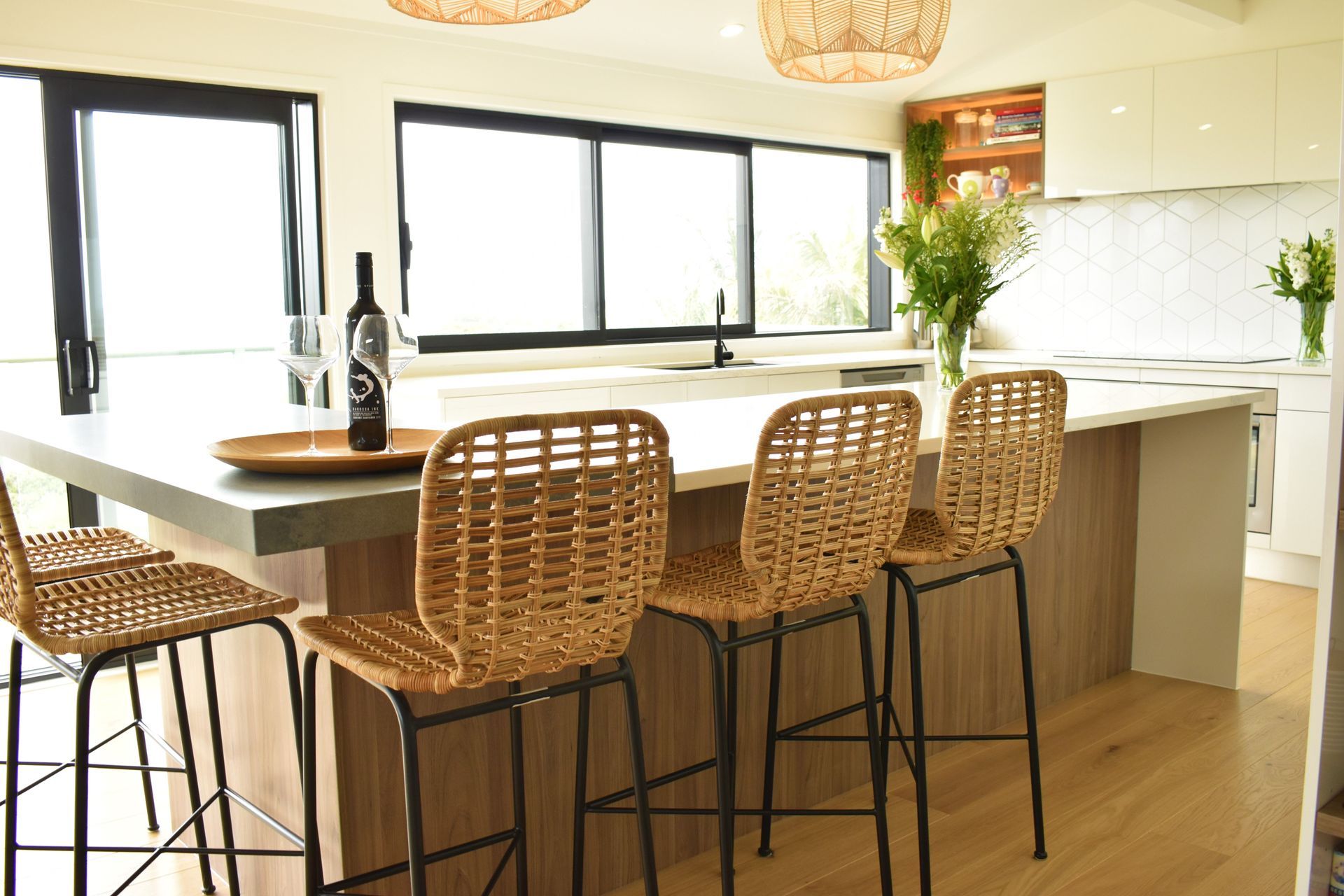 Using 2x different benchtops, both in colour and thickness along with Melamine panels we were able to give the client the desired look they were after