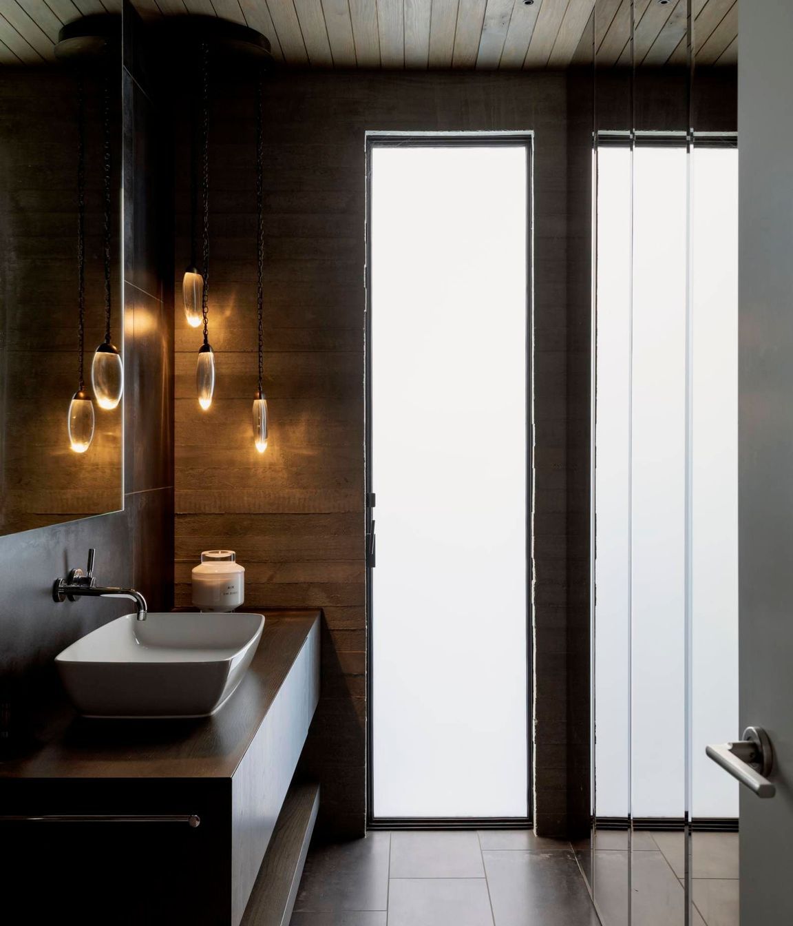 The powder room on the main level is a statement in simplicity.