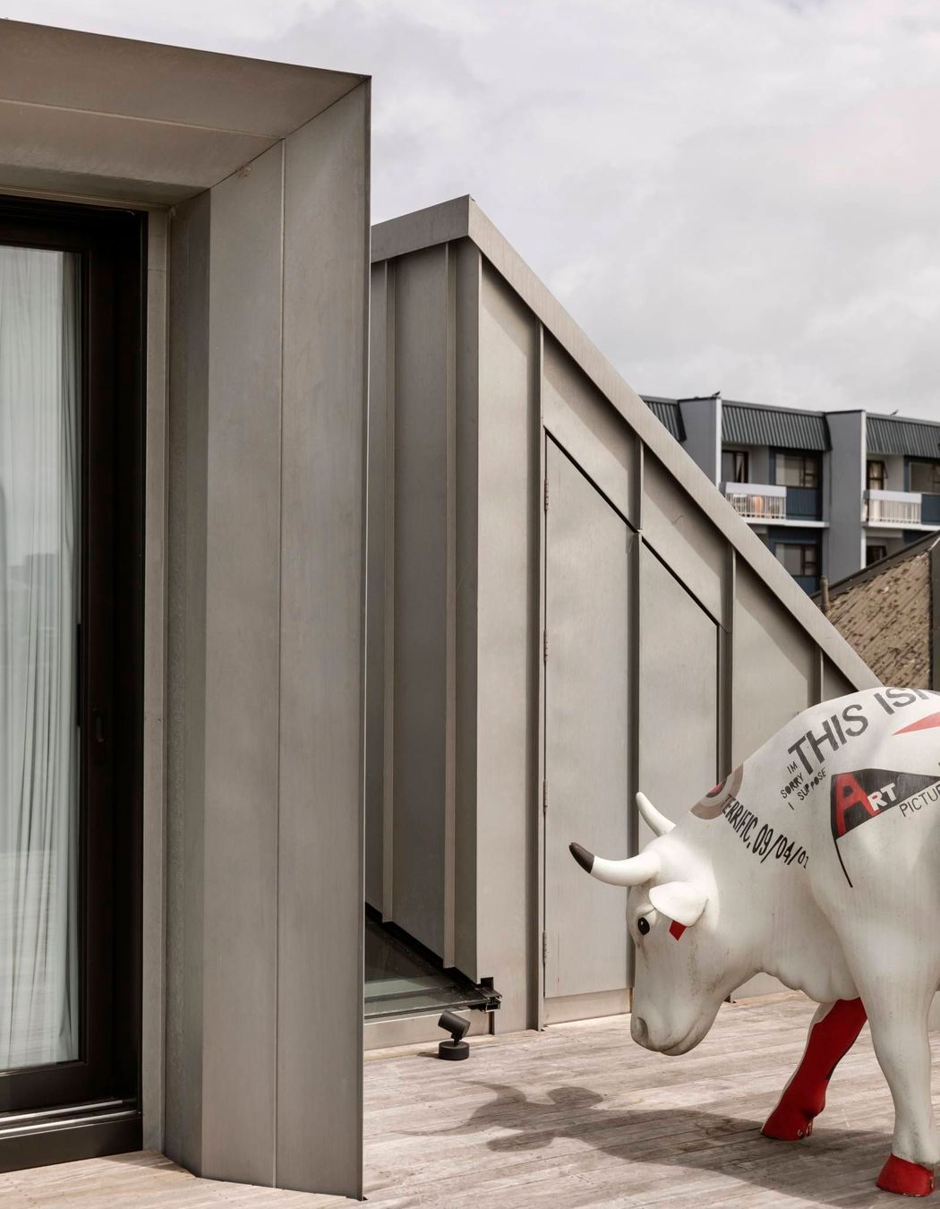 Terne-coated stainless steel was chosen as the roofing and limited siding material.