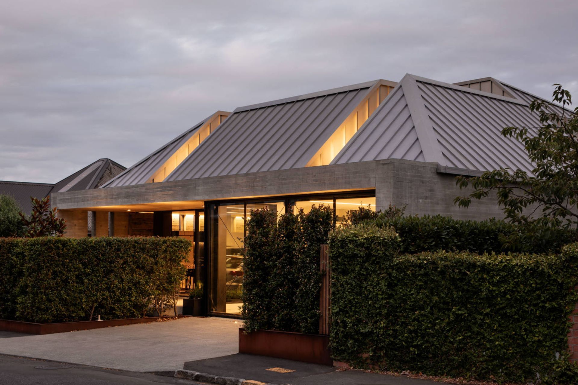 From the street the house has been designed to read as a single-storey home of symmetrical composition and balanced proportions.