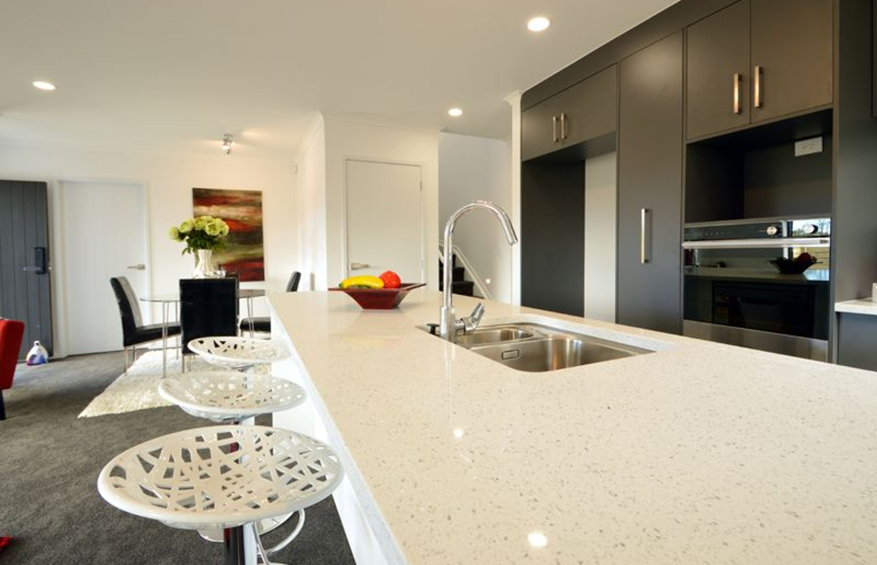 Kitchen - Modern user friendly kitchen with lots of light and breakfast bar for the family to enjoy