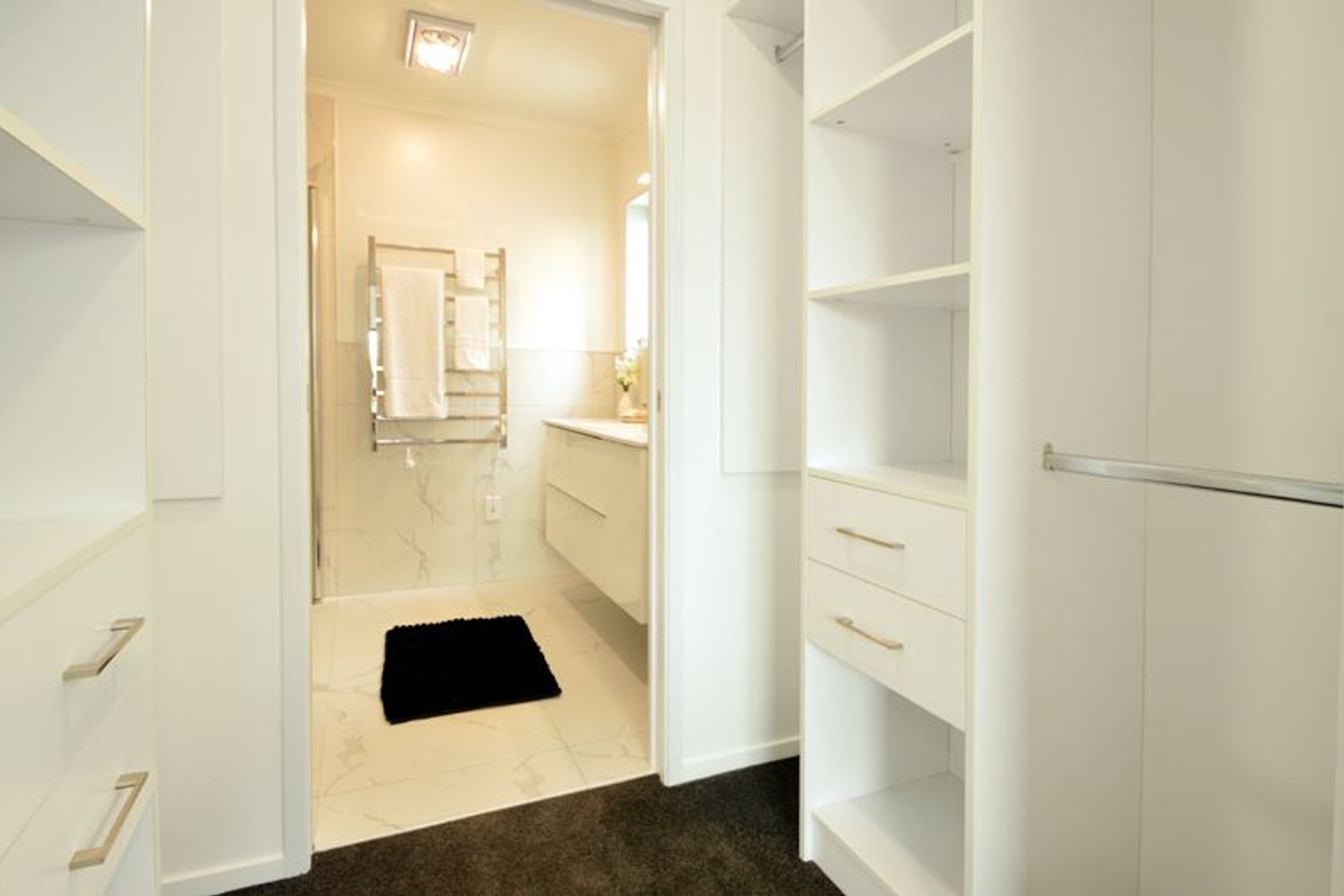 Master Wardrobe - Large his and her walk through master wardrobe