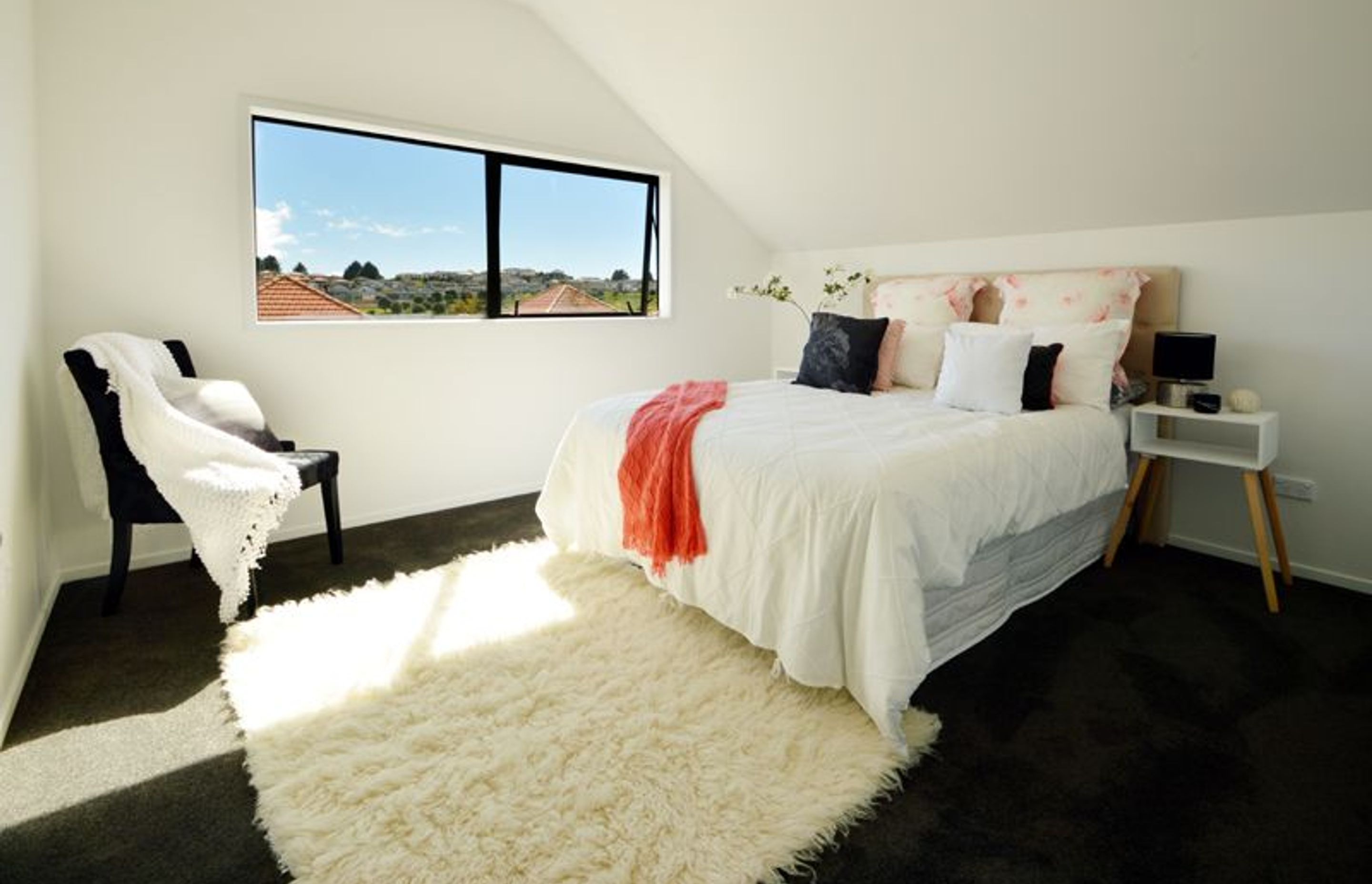 Mini Master - Second master bedroom, complete with walk in wardrobe and shared bathroom and views over Gulf Harbour