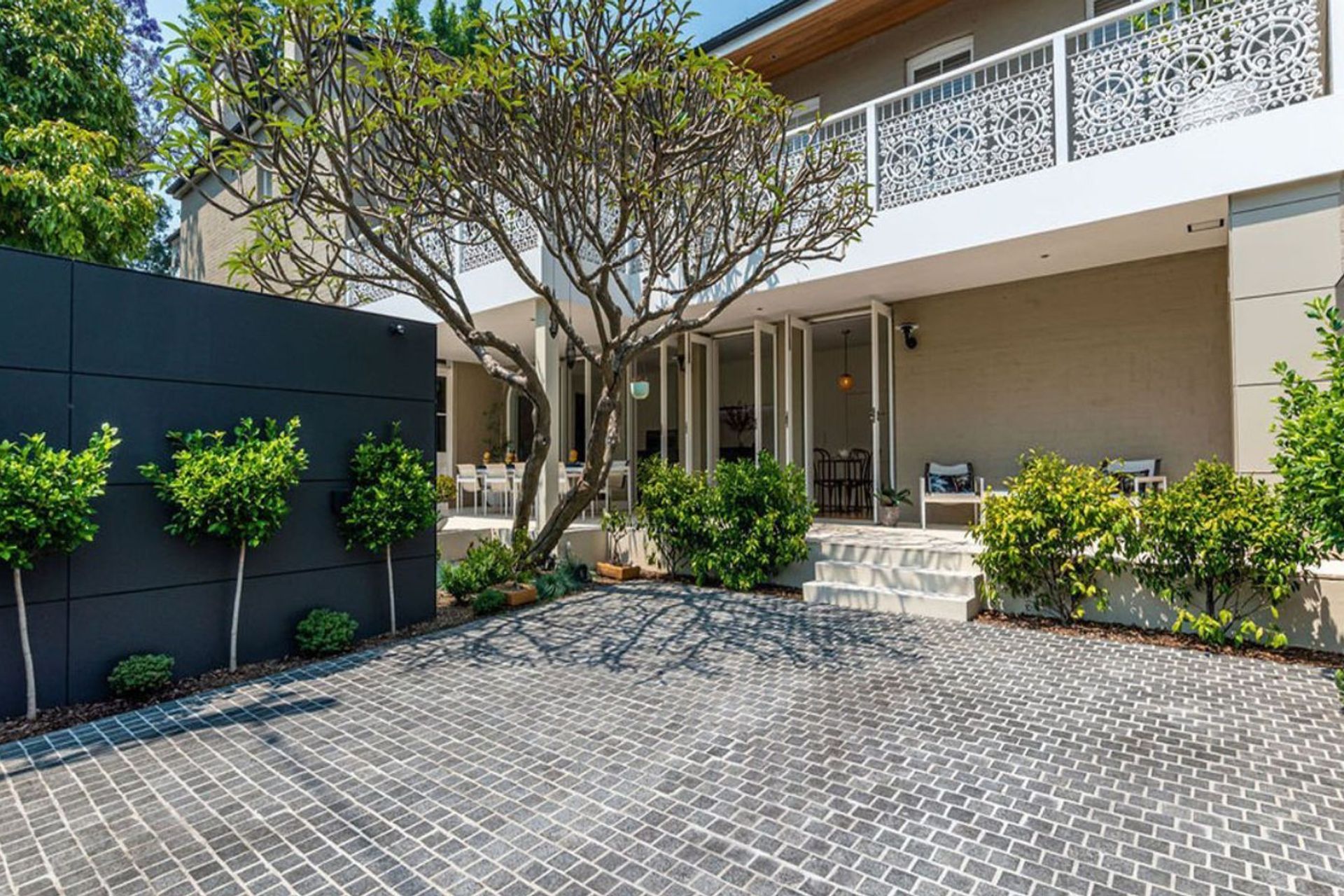 Charcoal Granite Cobblestones |  Gardner Design