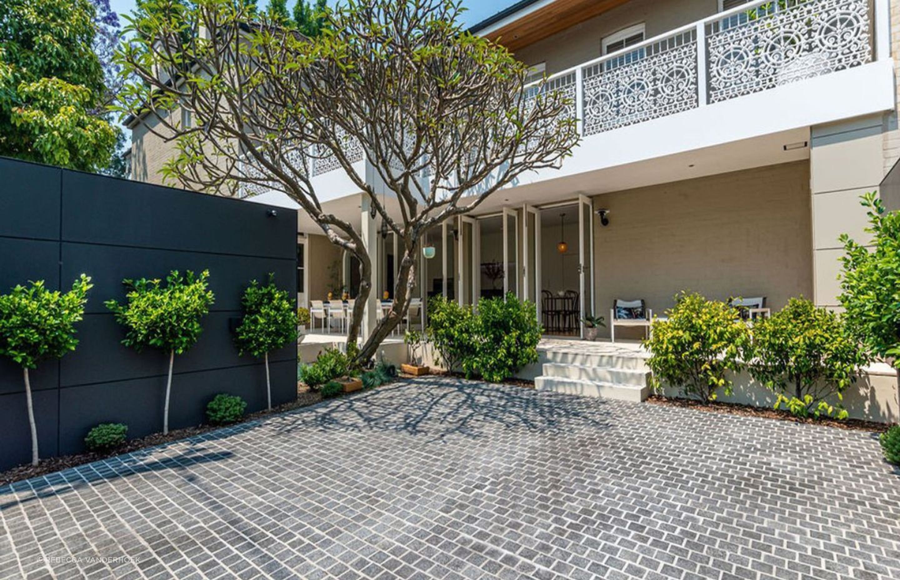 Charcoal Granite Cobblestones |  Gardner Design