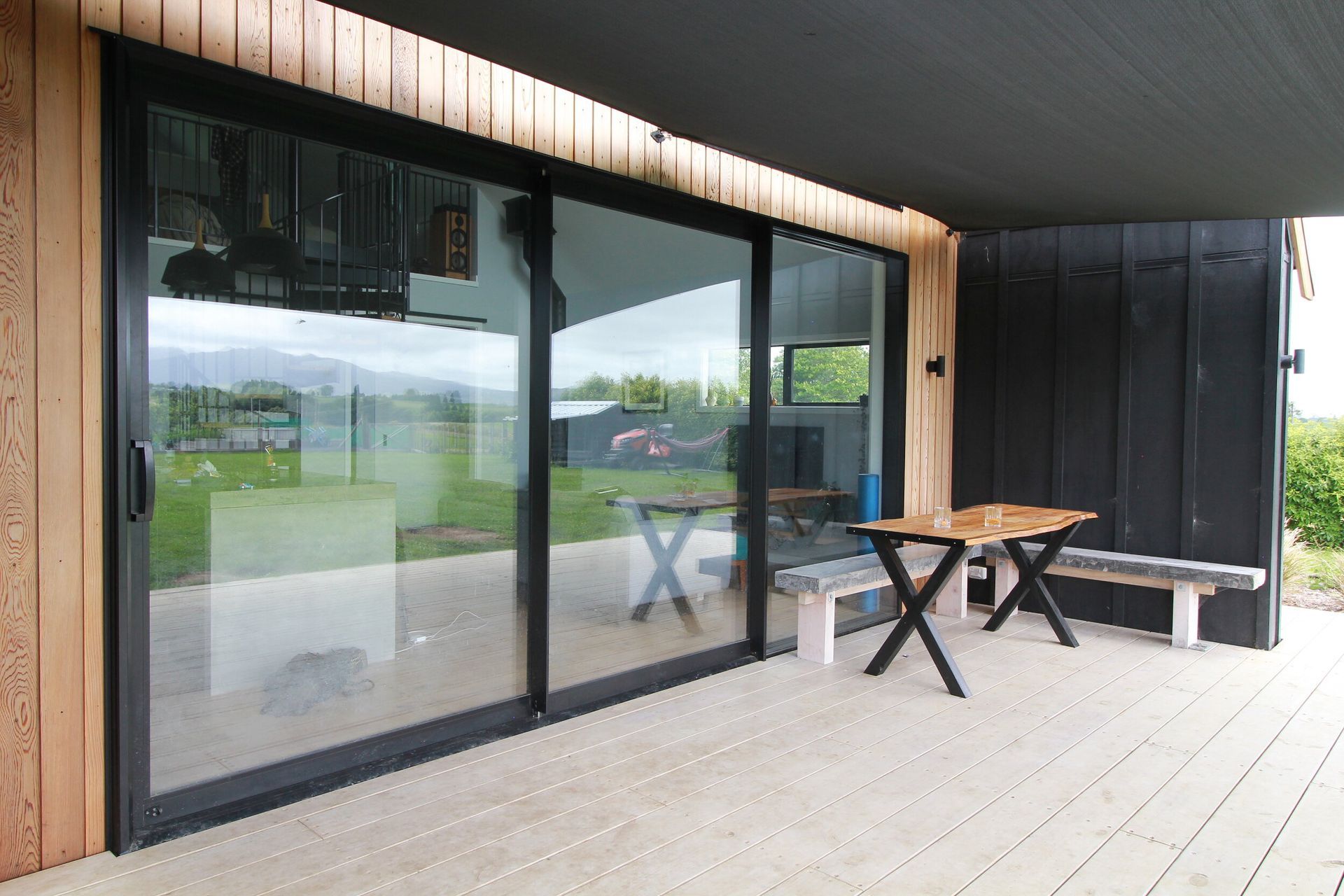 A not messing around full size 200x50 boardwalk style deck finished the outdoor living. matching the big space and feel.