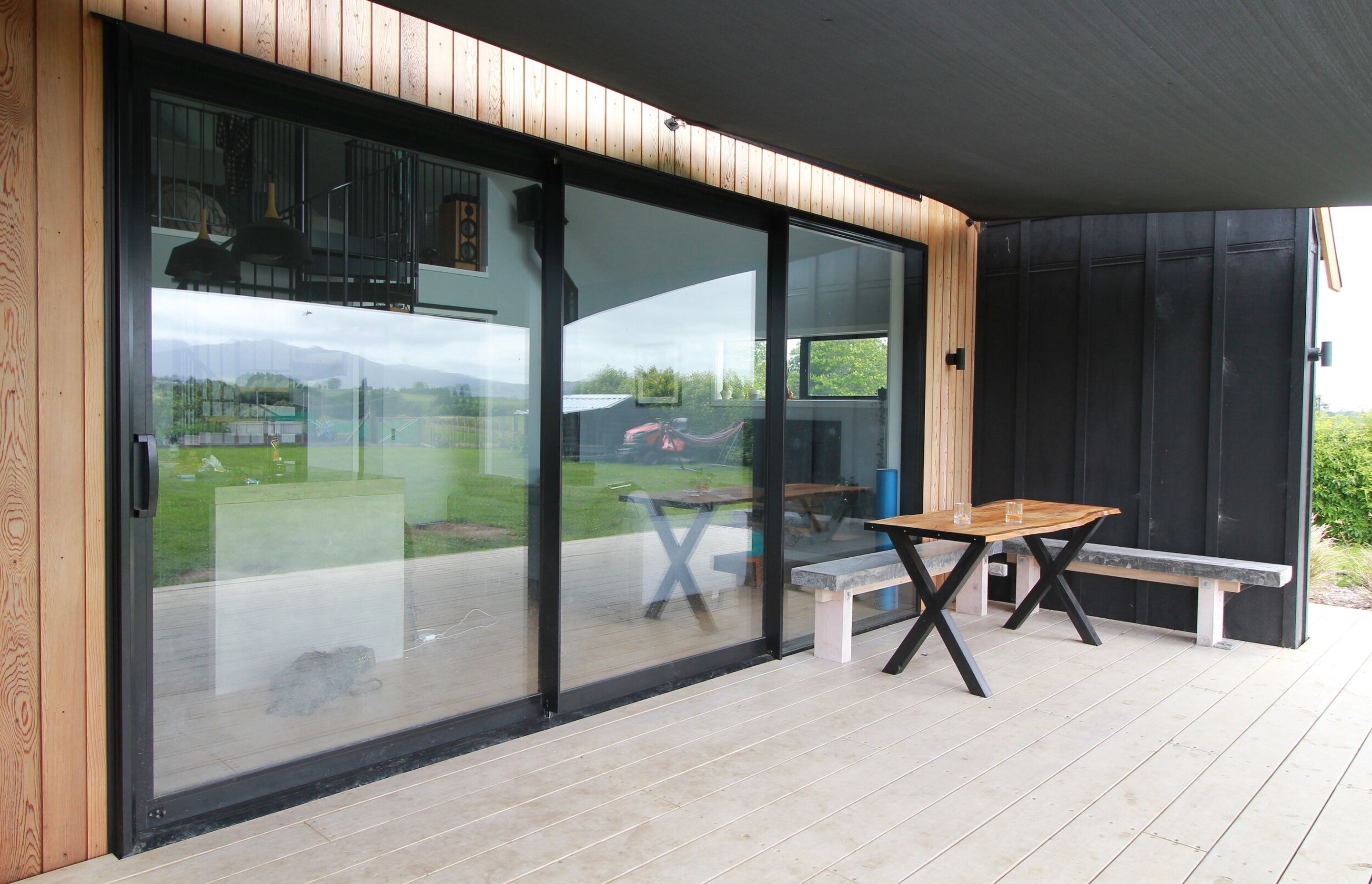 A not messing around full size 200x50 boardwalk style deck finished the outdoor living. matching the big space and feel.