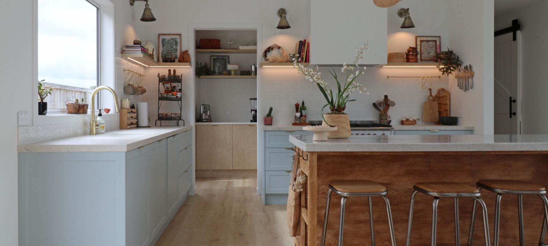 Kitchen in Blues with a French Country Island banner