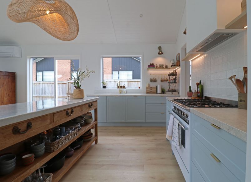 Kitchen in Blues with a French Country Island