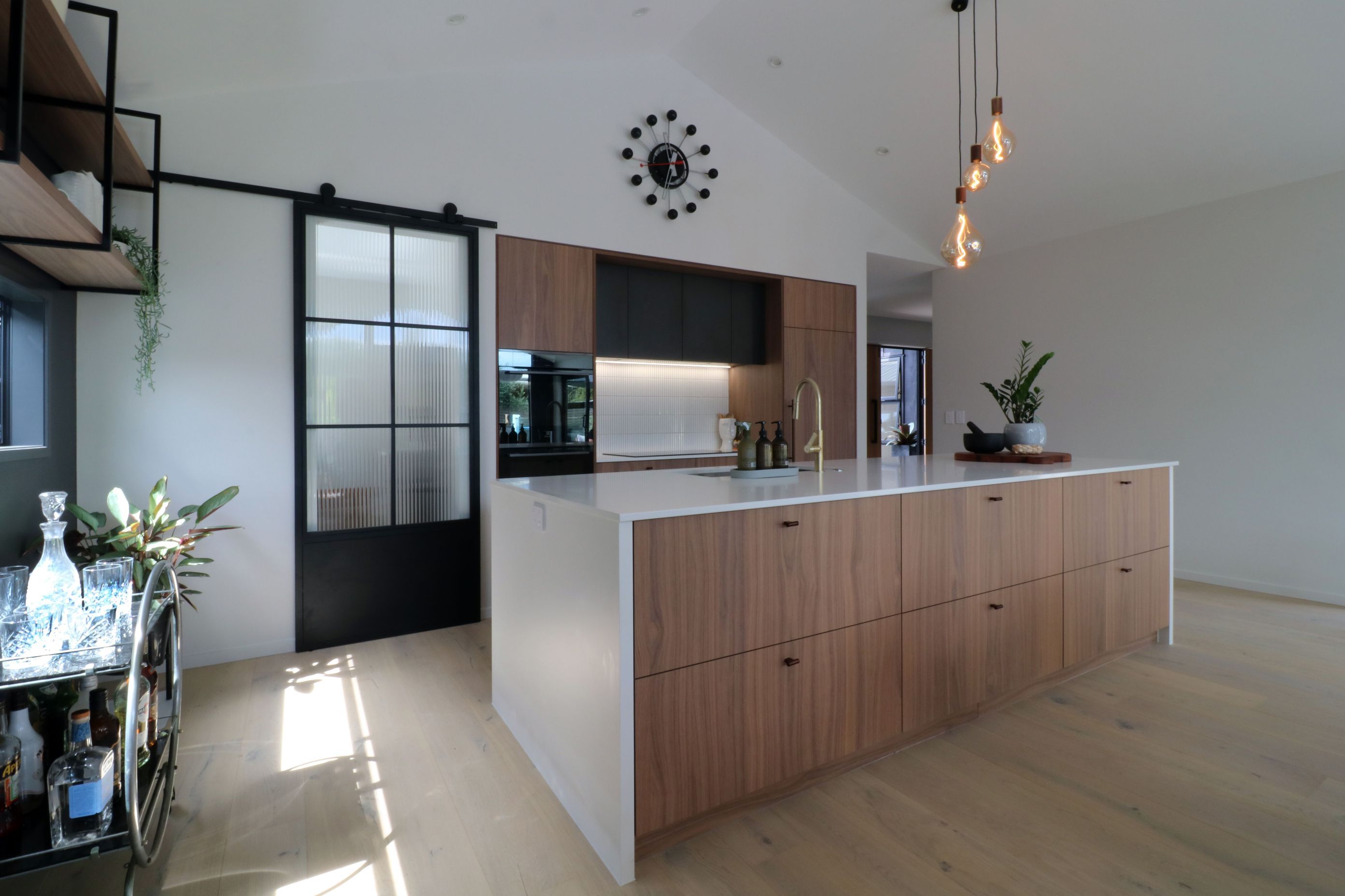 Walnut Veneer with Dark Cabinetry