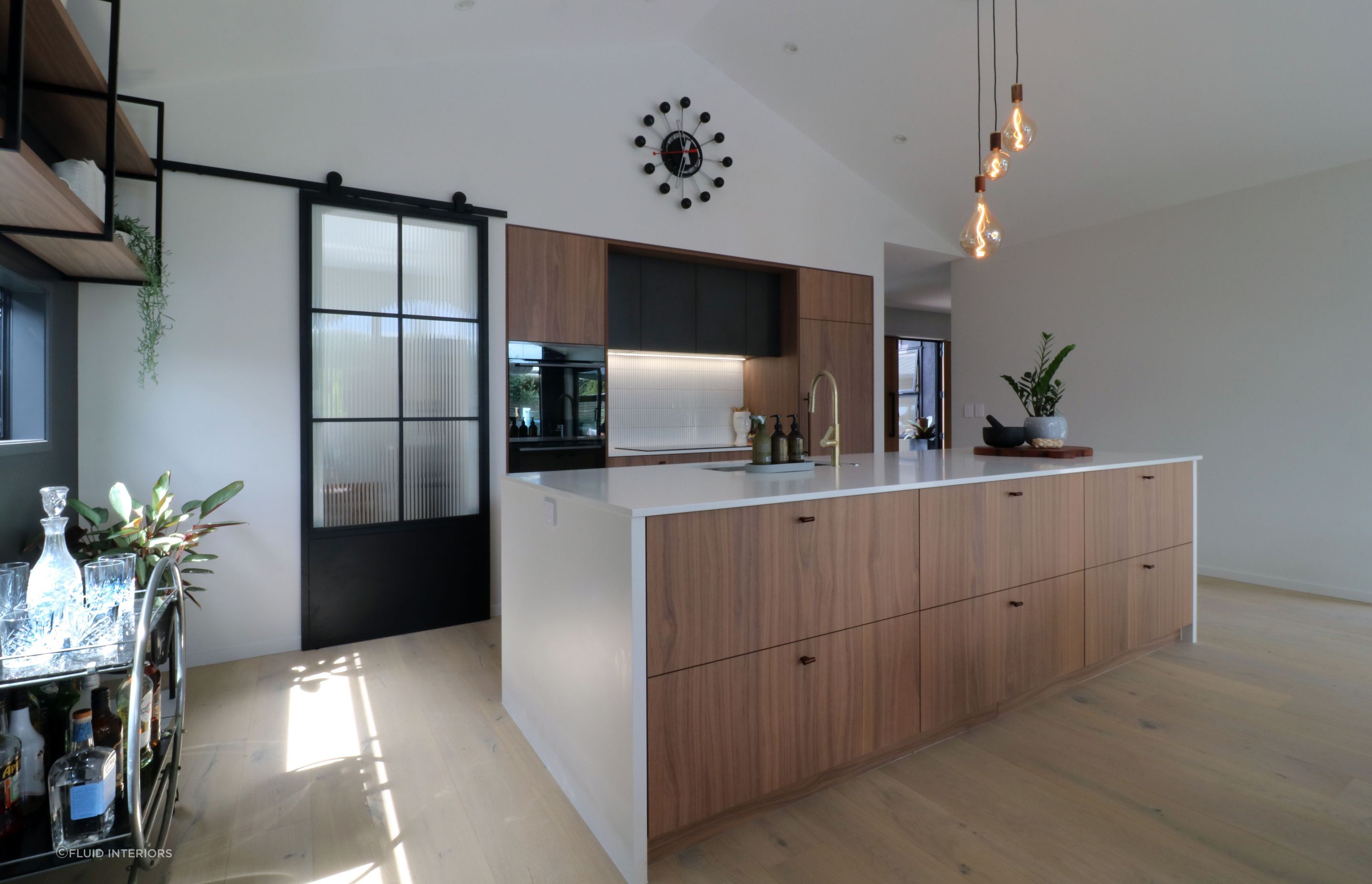 Walnut Veneer with Dark Cabinetry