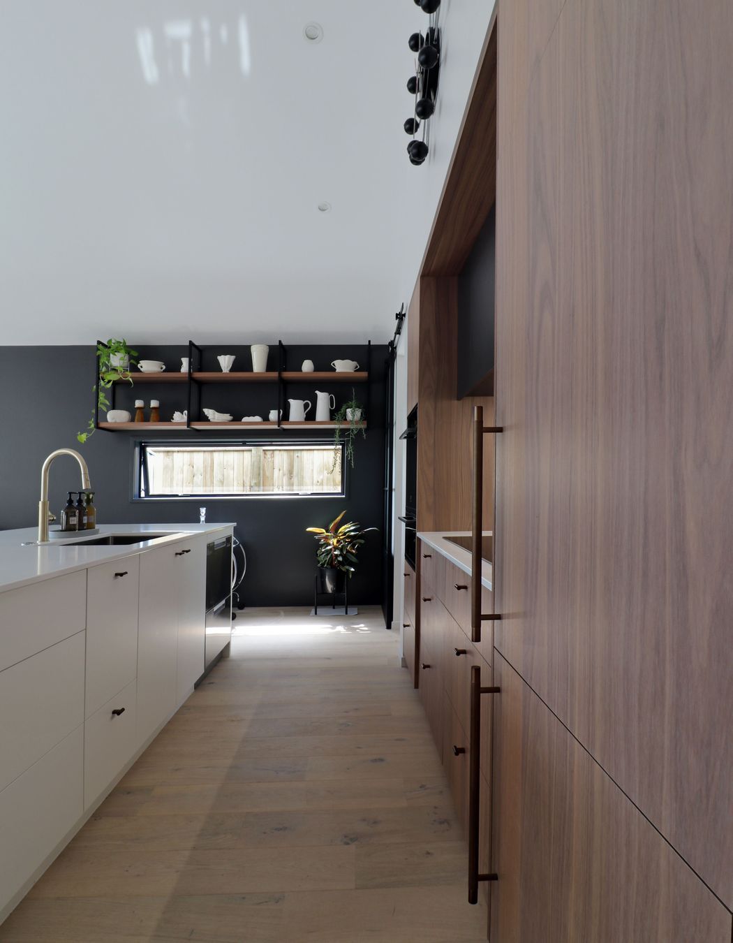 Walnut Veneer with Dark Cabinetry