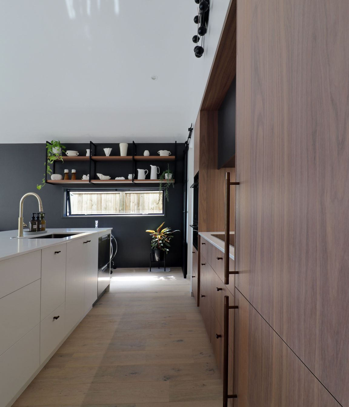 Walnut Veneer with Dark Cabinetry