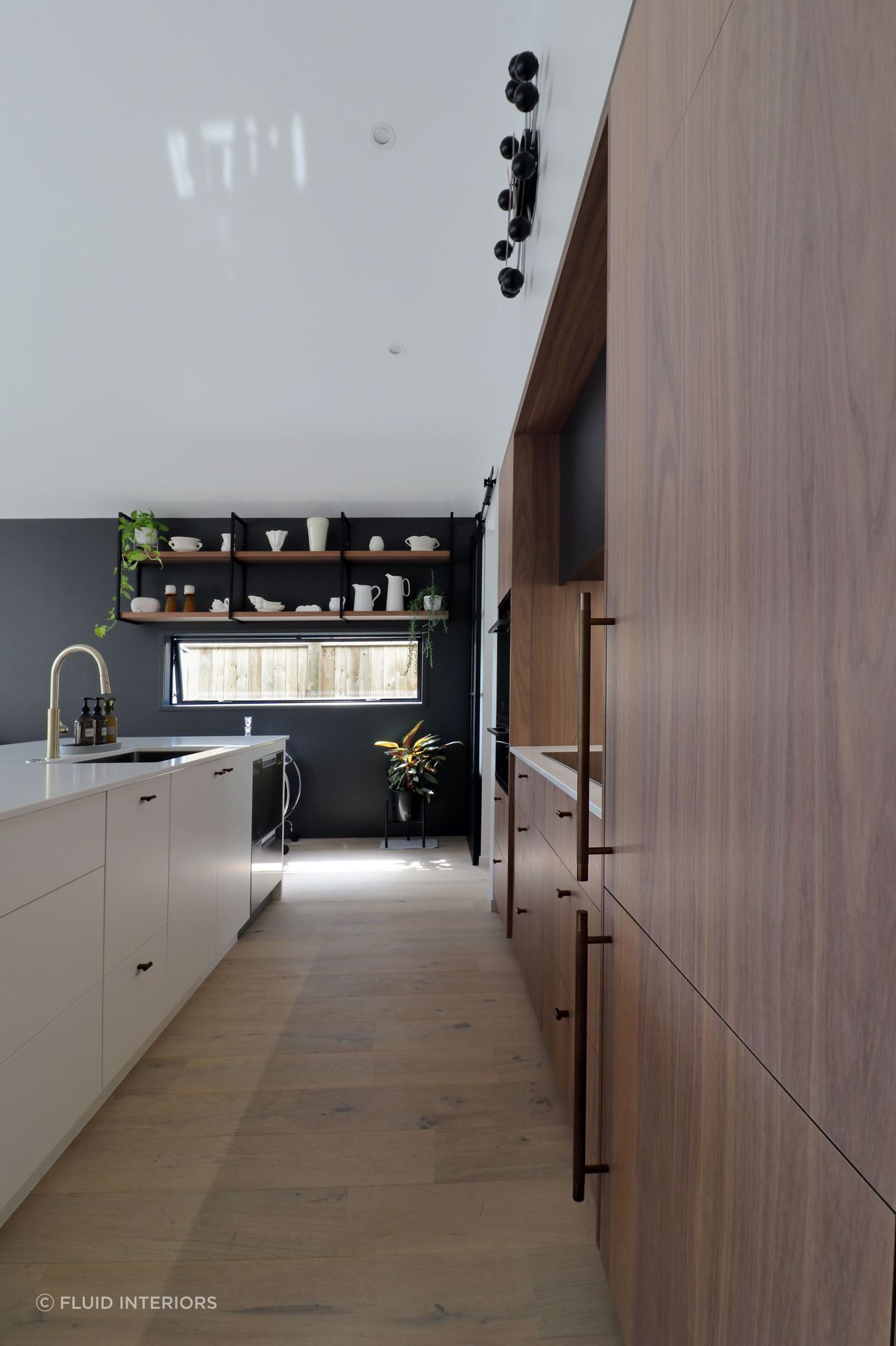 Walnut Veneer with Dark Cabinetry