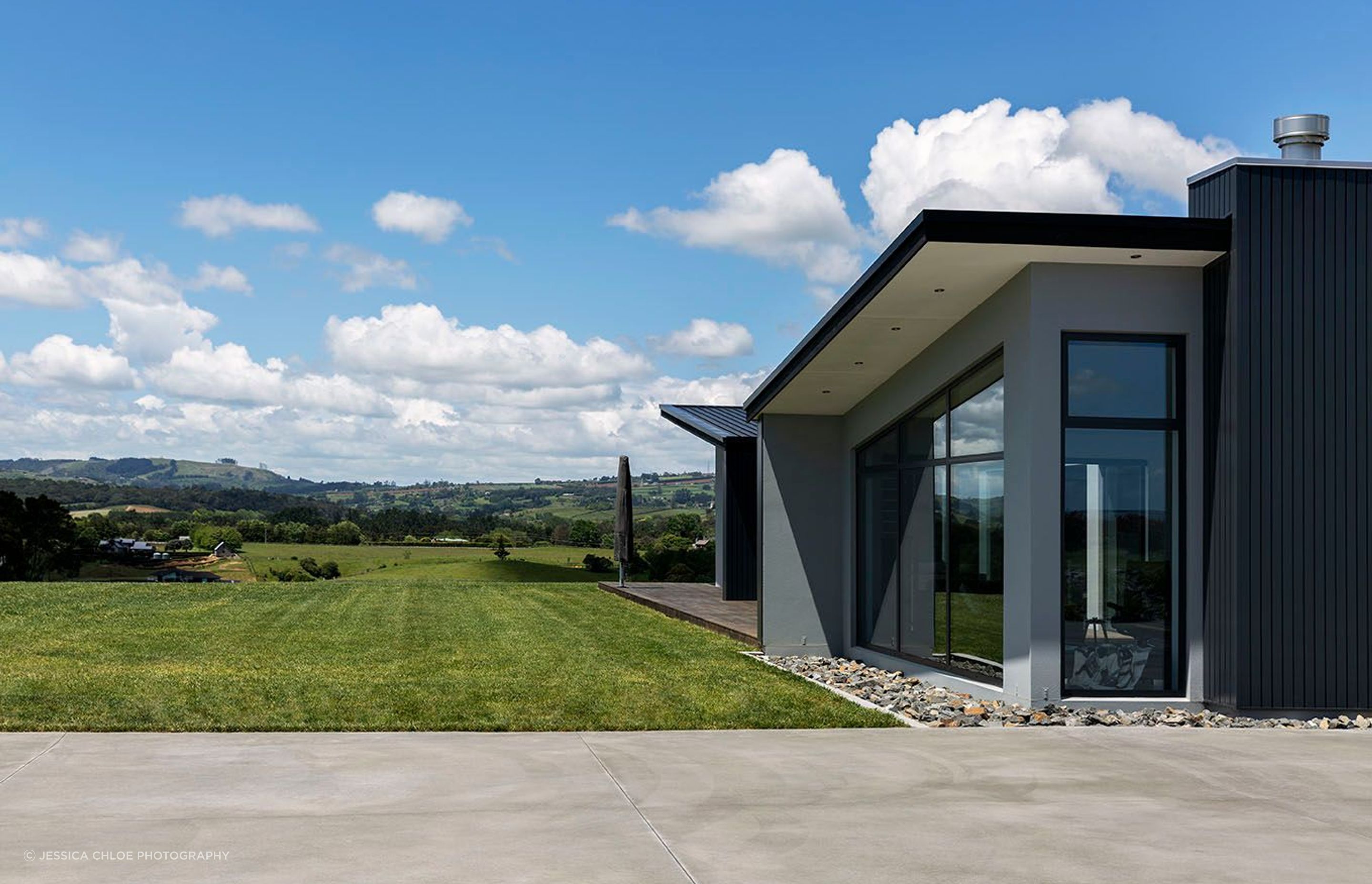 Butterfly roof brings dynamic lines to the hilltop residence