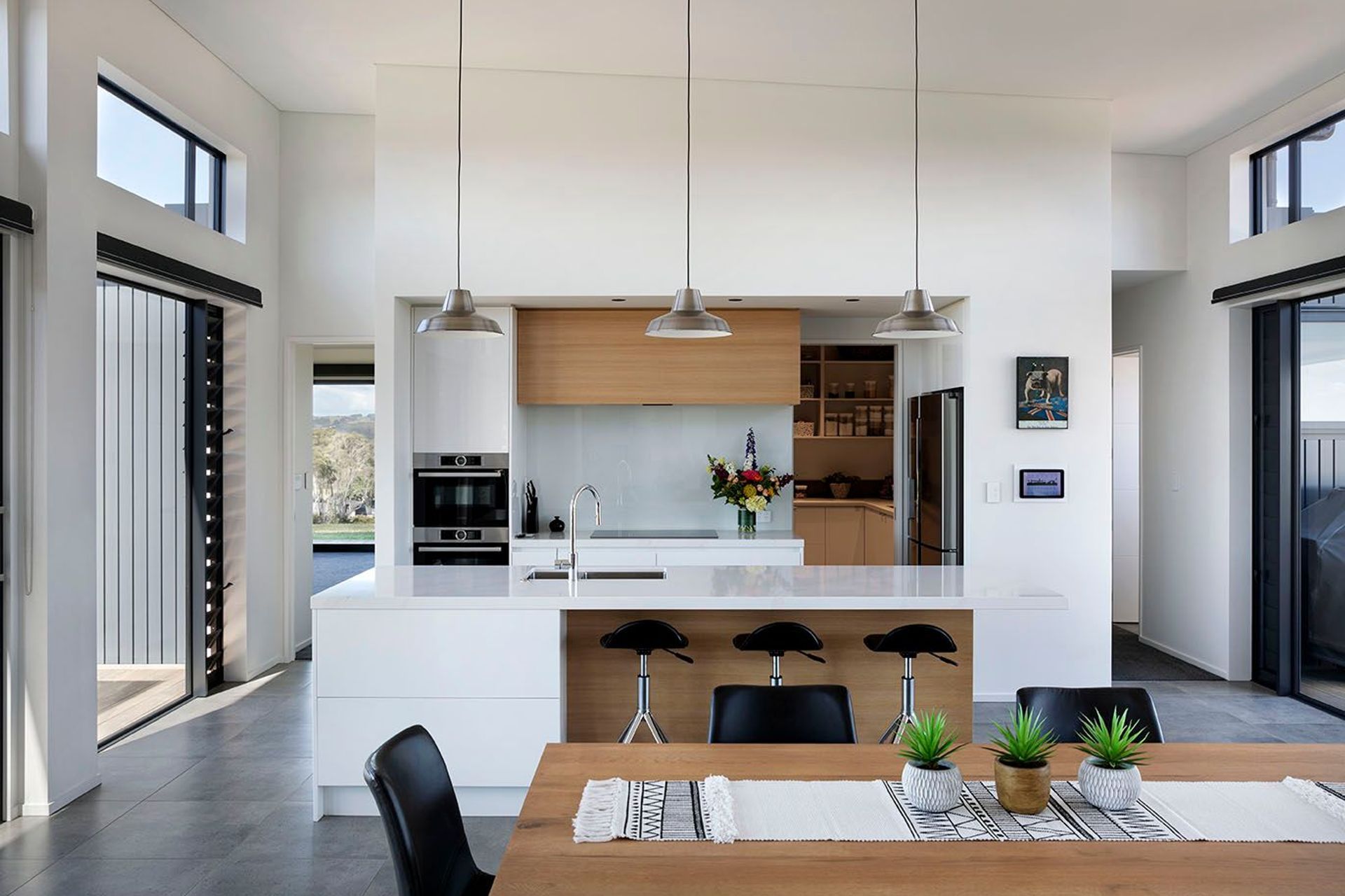 Kitchen allows open plan living and flow to the living spaces