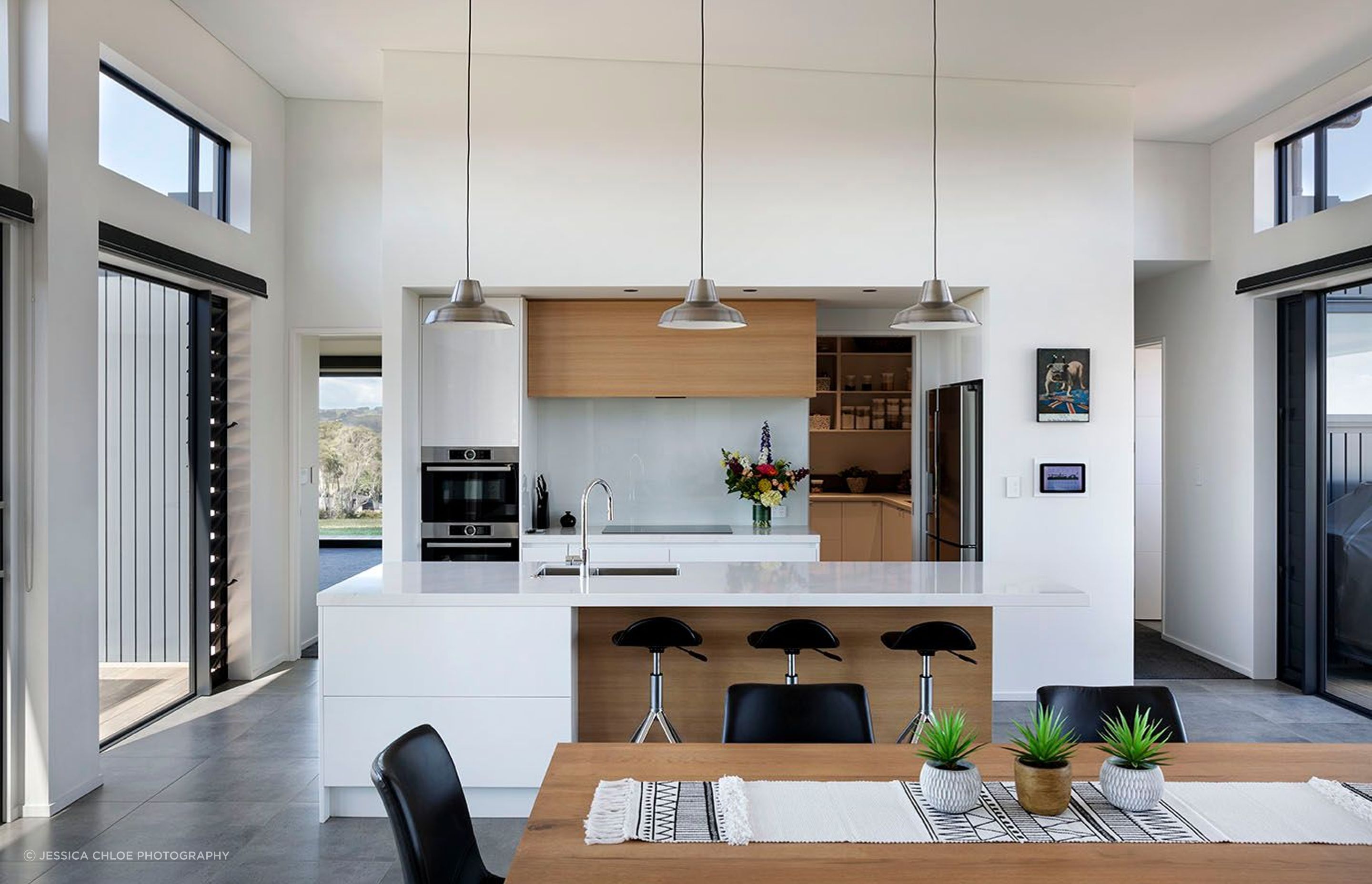 Kitchen allows open plan living and flow to the living spaces