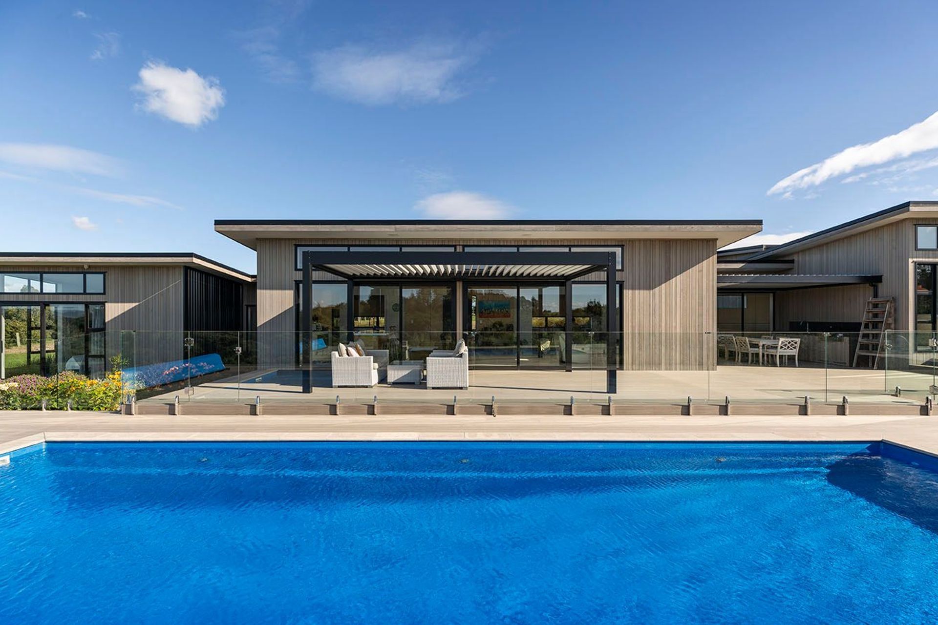 Seamless pool areas connecting back to the dwelling