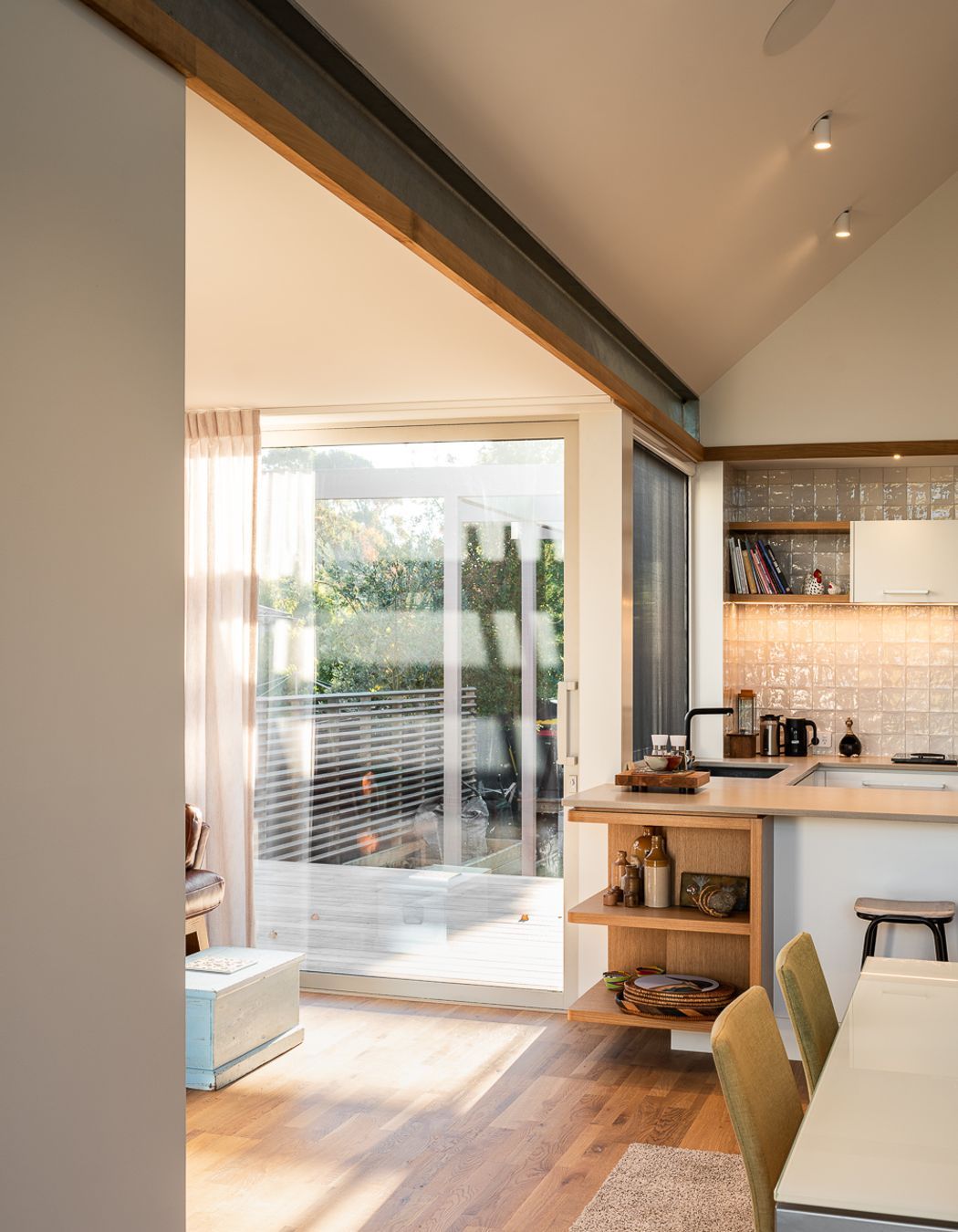 The raked ceiling in the living space offers a generous volume to the interior.