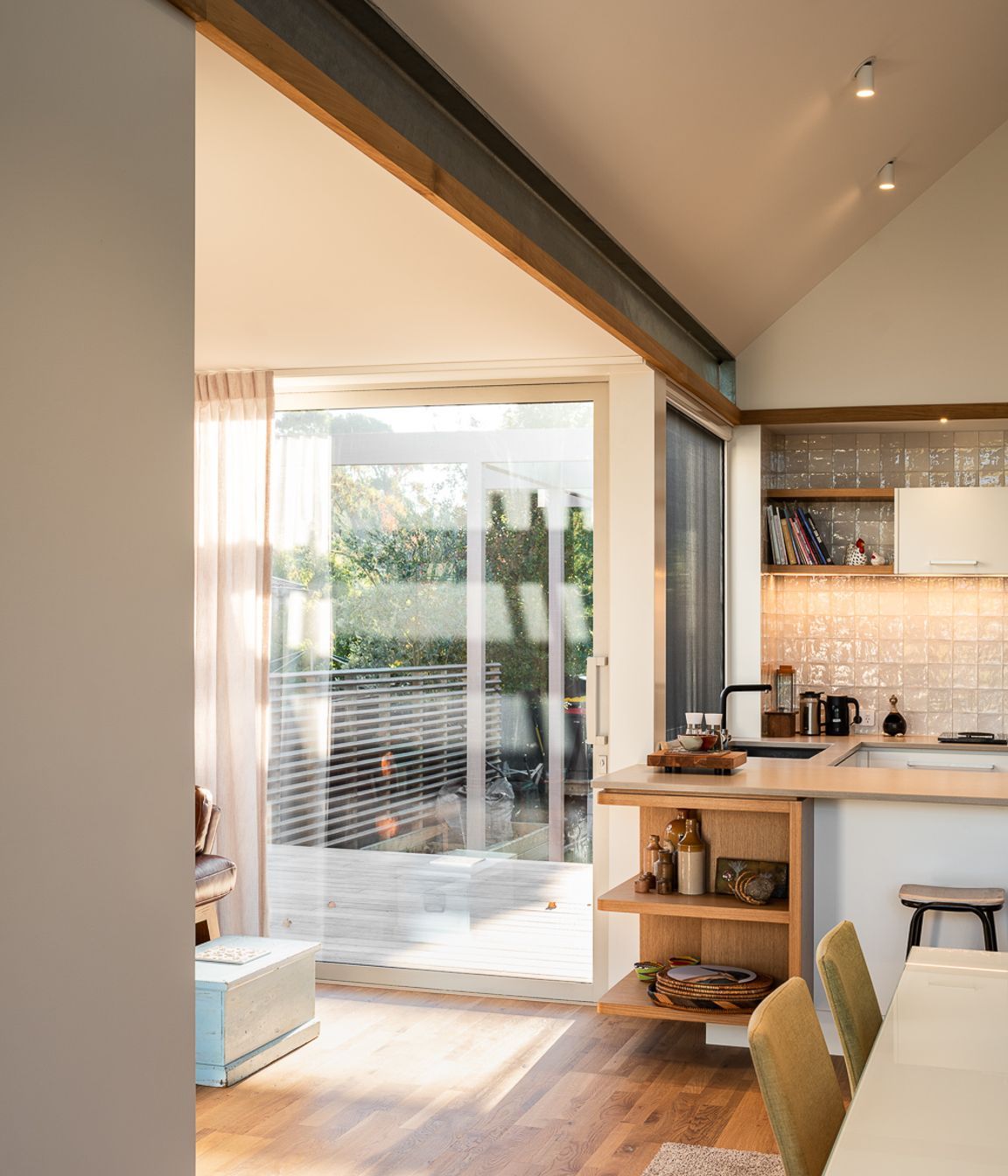 The raked ceiling in the living space offers a generous volume to the interior.