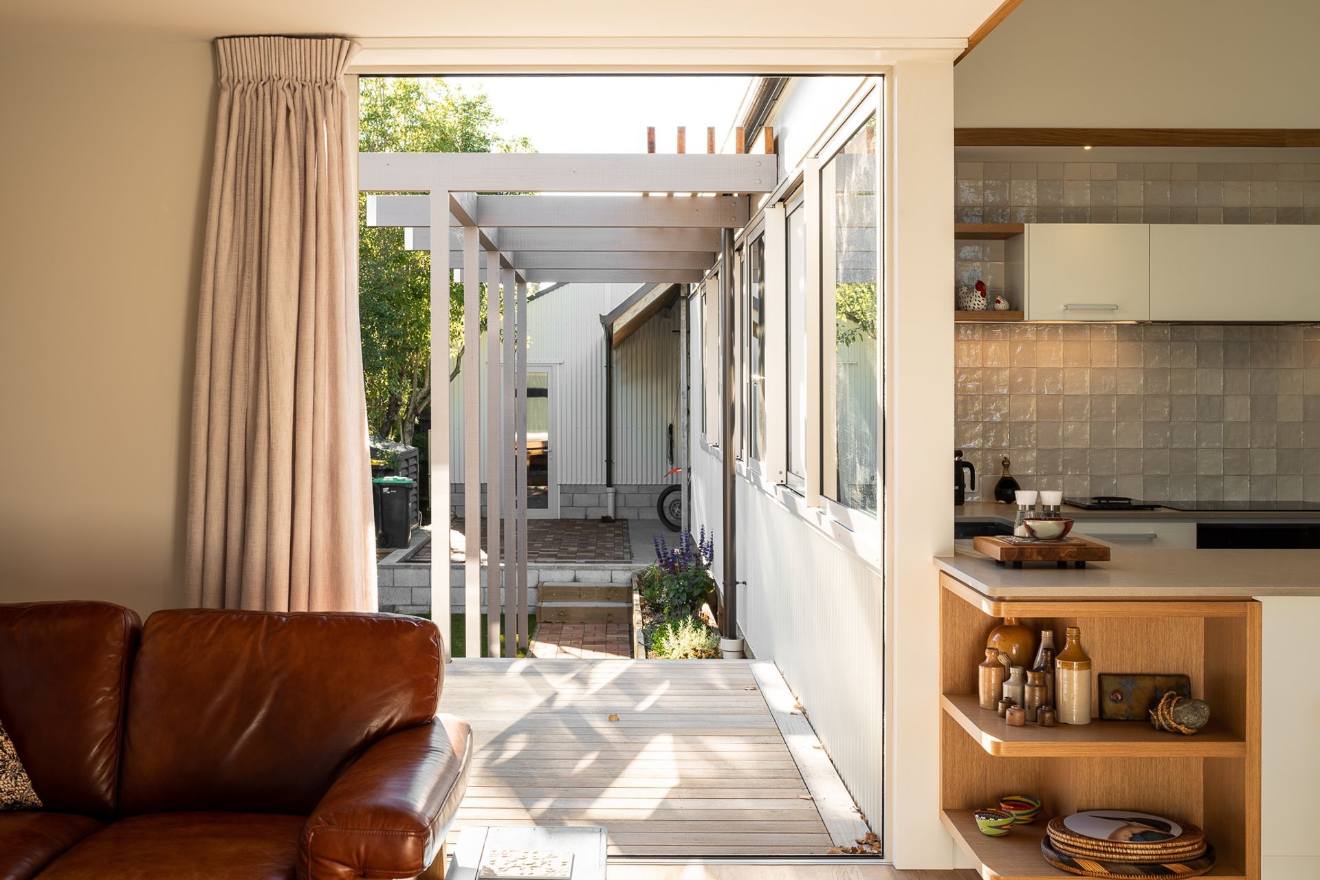 On the interior, a simple palette of materials and colours creates a clean and tactile space.