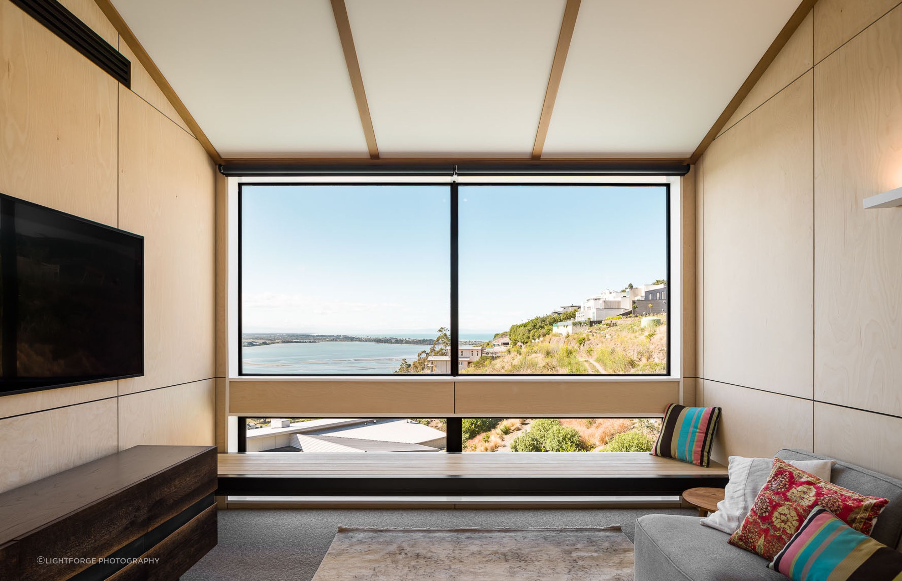 A break-out space off the main bedroom gives the homeowners a private area they can retreat to at the end of the day.