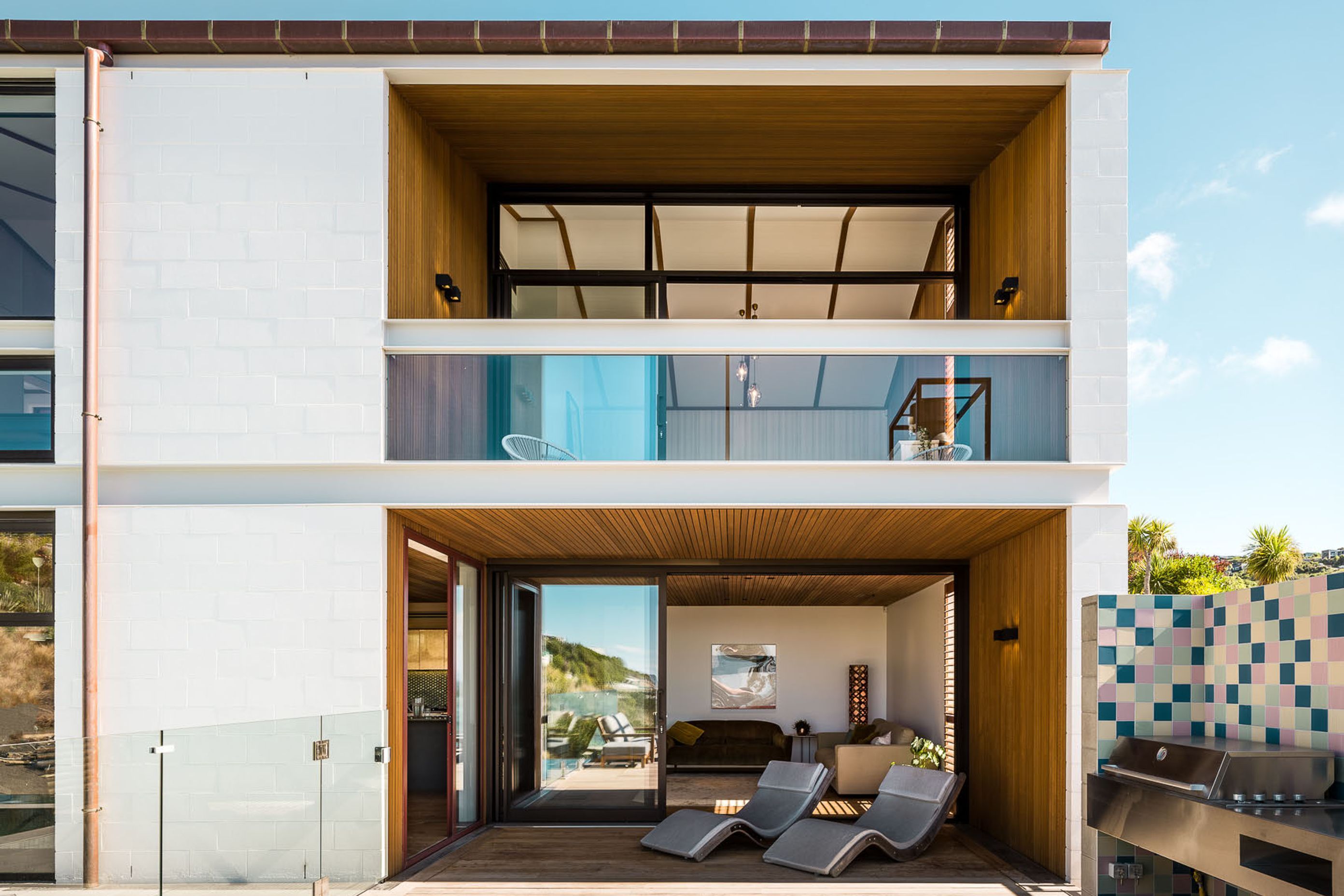 The material palette incorporates concrete, steel, glass and timber—all widely used in the Christchurch Style.
