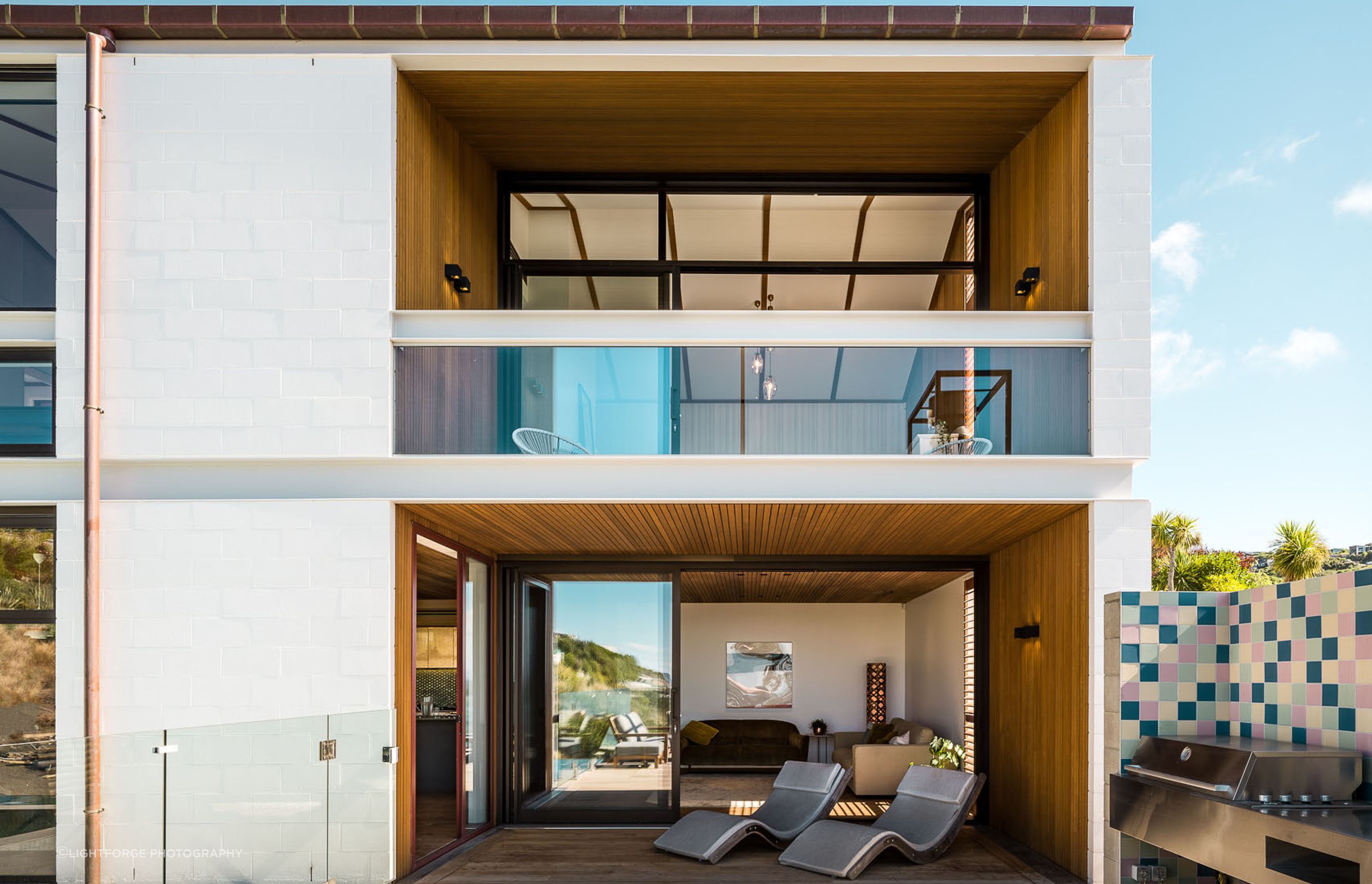 The material palette incorporates concrete, steel, glass and timber—all widely used in the Christchurch Style.