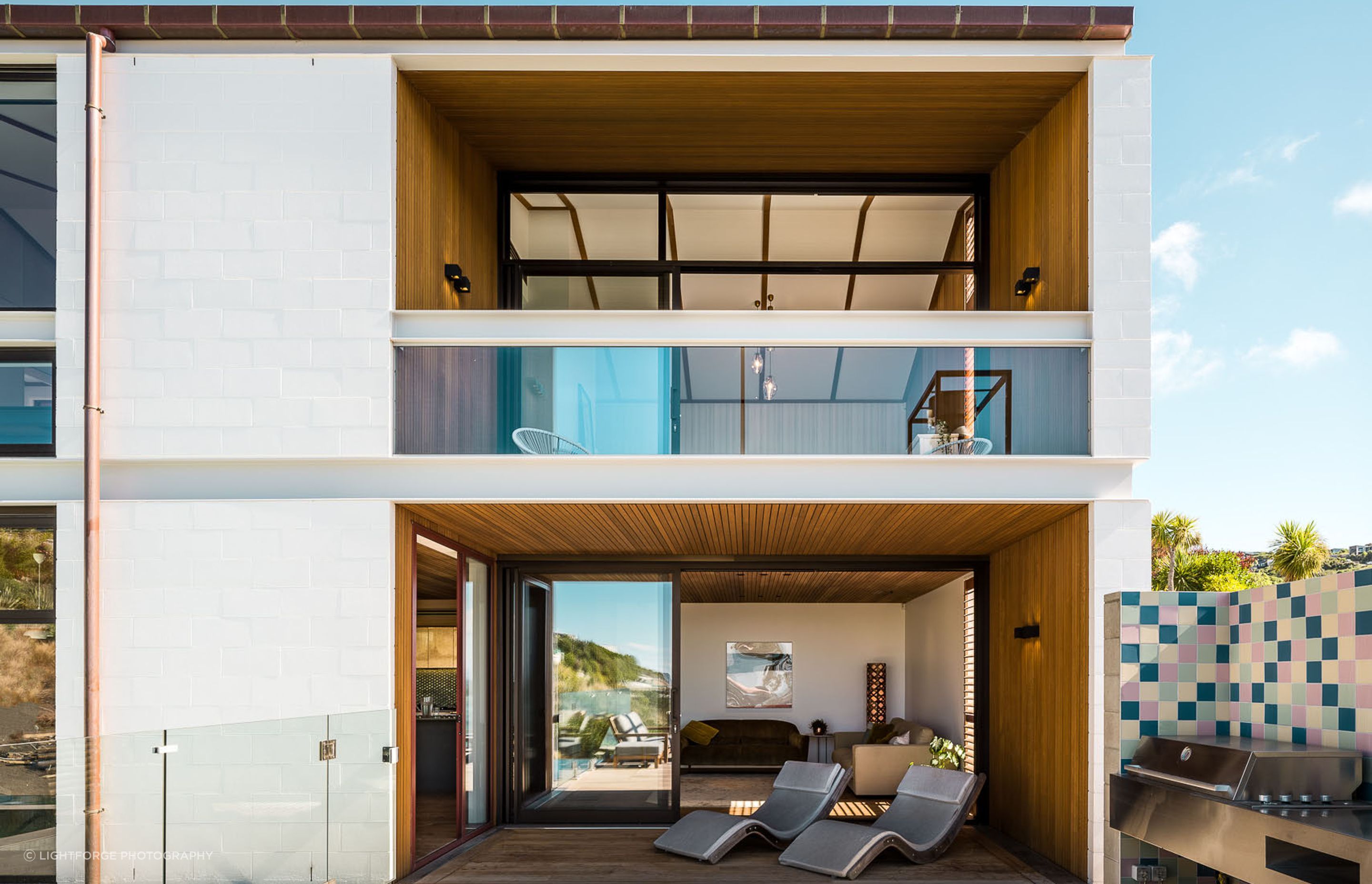 The material palette incorporates concrete, steel, glass and timber—all widely used in the Christchurch Style.