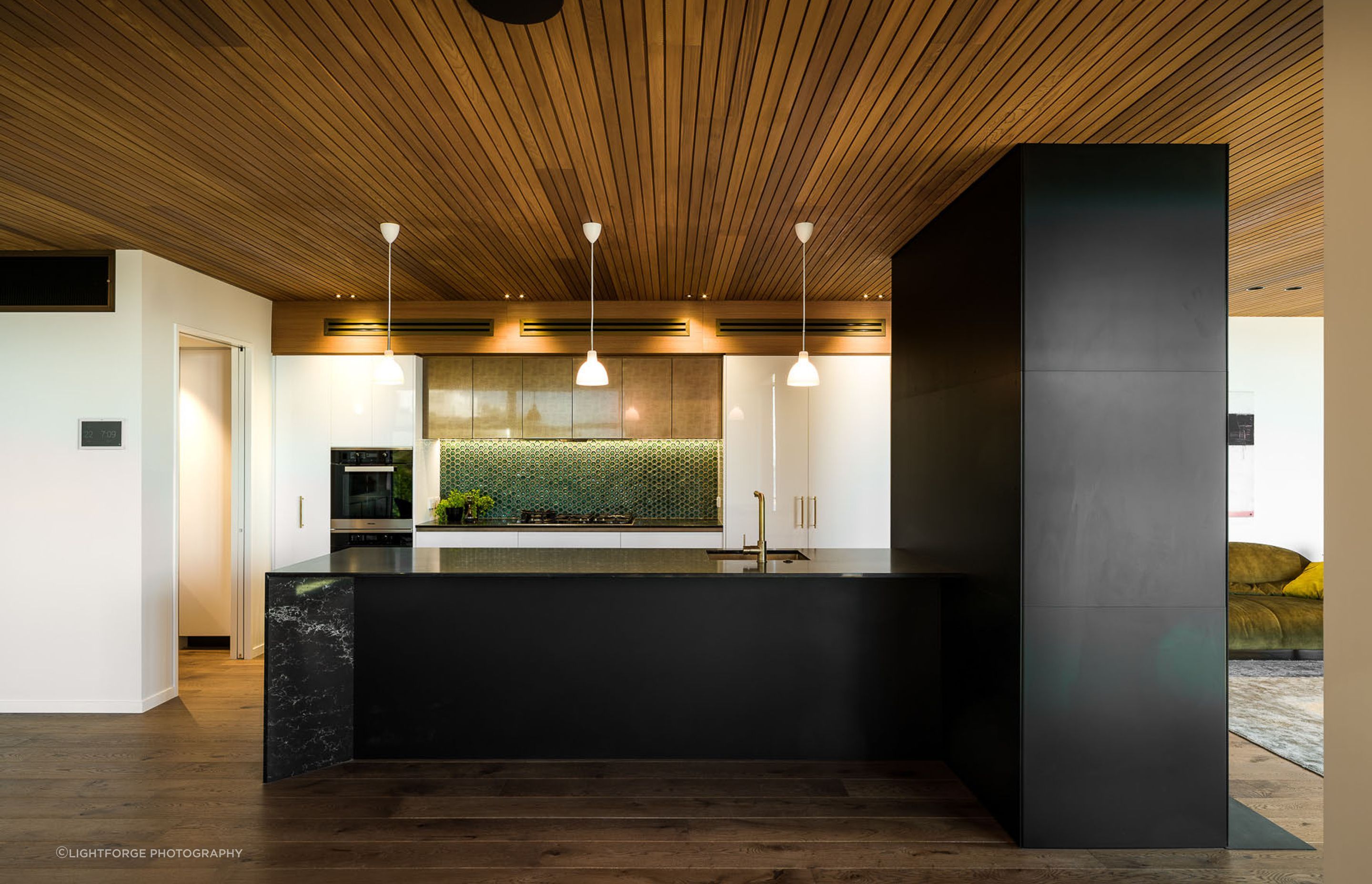 The influence of the Christchurch Style lends the interiors a retro feel, enhanced by the colour palette of natural timbers and solid colours.