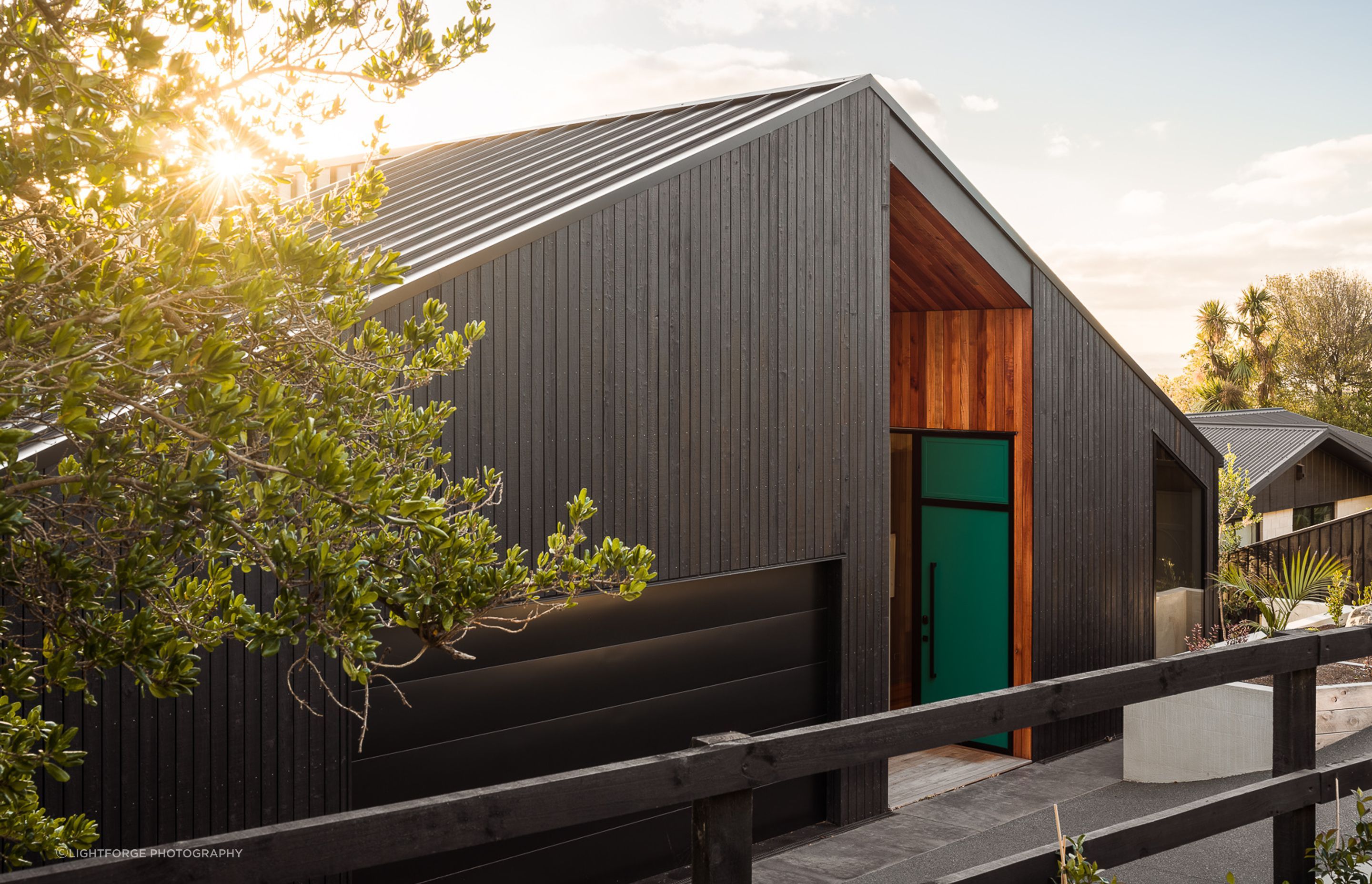 A pop of colour brings vibrancy and leaves no doubt in the mind of visitors as to where the front door is.