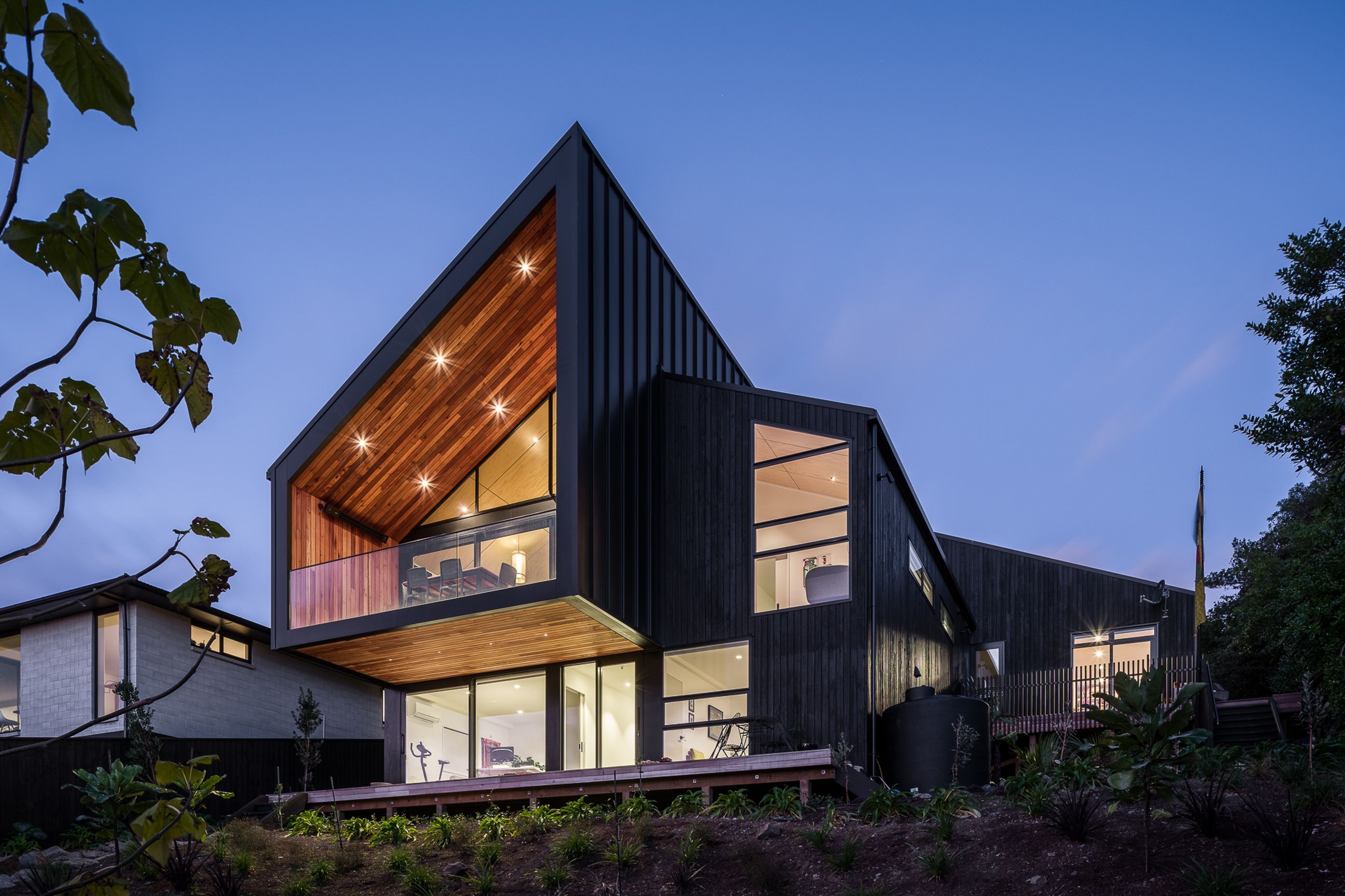 The site was a bare block when the current owners purchased it; the previous house having been damaged in the earthquakes and subsequently removed. The new home was designed to be in keeping with the original footprint.