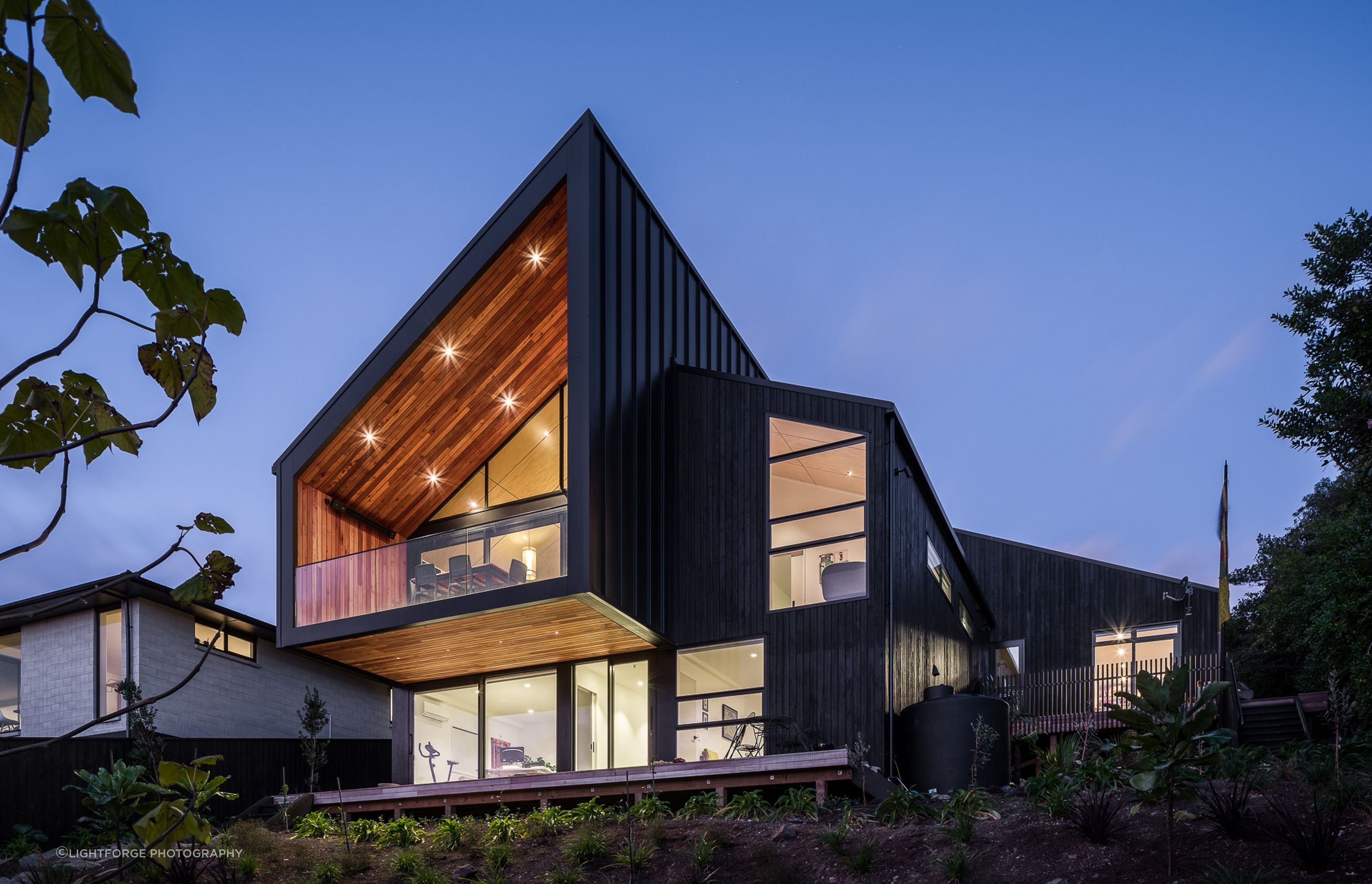 The site was a bare block when the current owners purchased it; the previous house having been damaged in the earthquakes and subsequently removed. The new home was designed to be in keeping with the original footprint.