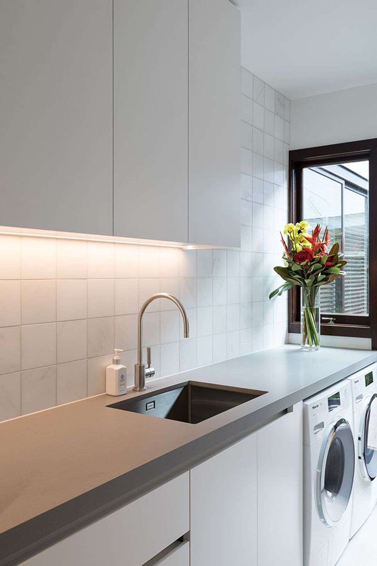 Laundry-designed-by-Aveora-Products-used-Switch-Lighting-Schneider-Electric-Saturn-Zen-switchgear.jpg